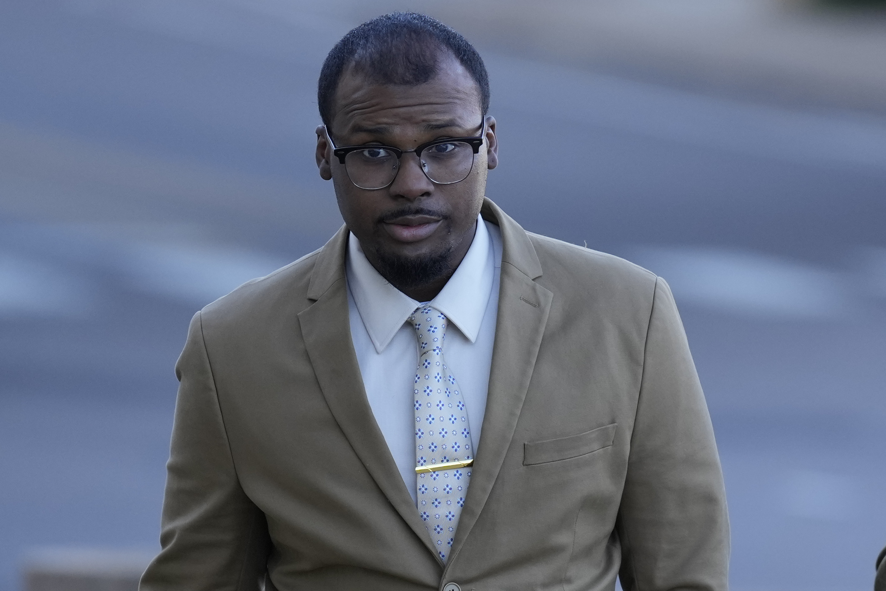 Justin Smith, one of three former Memphis police officers charged in the 2023 fatal beating of Tyre Nichols, arrives at the federal courthouse for the day's proceedings Thursday, Oct. 3, 2024, in Memphis, Tenn. (AP Photo/George Walker IV)