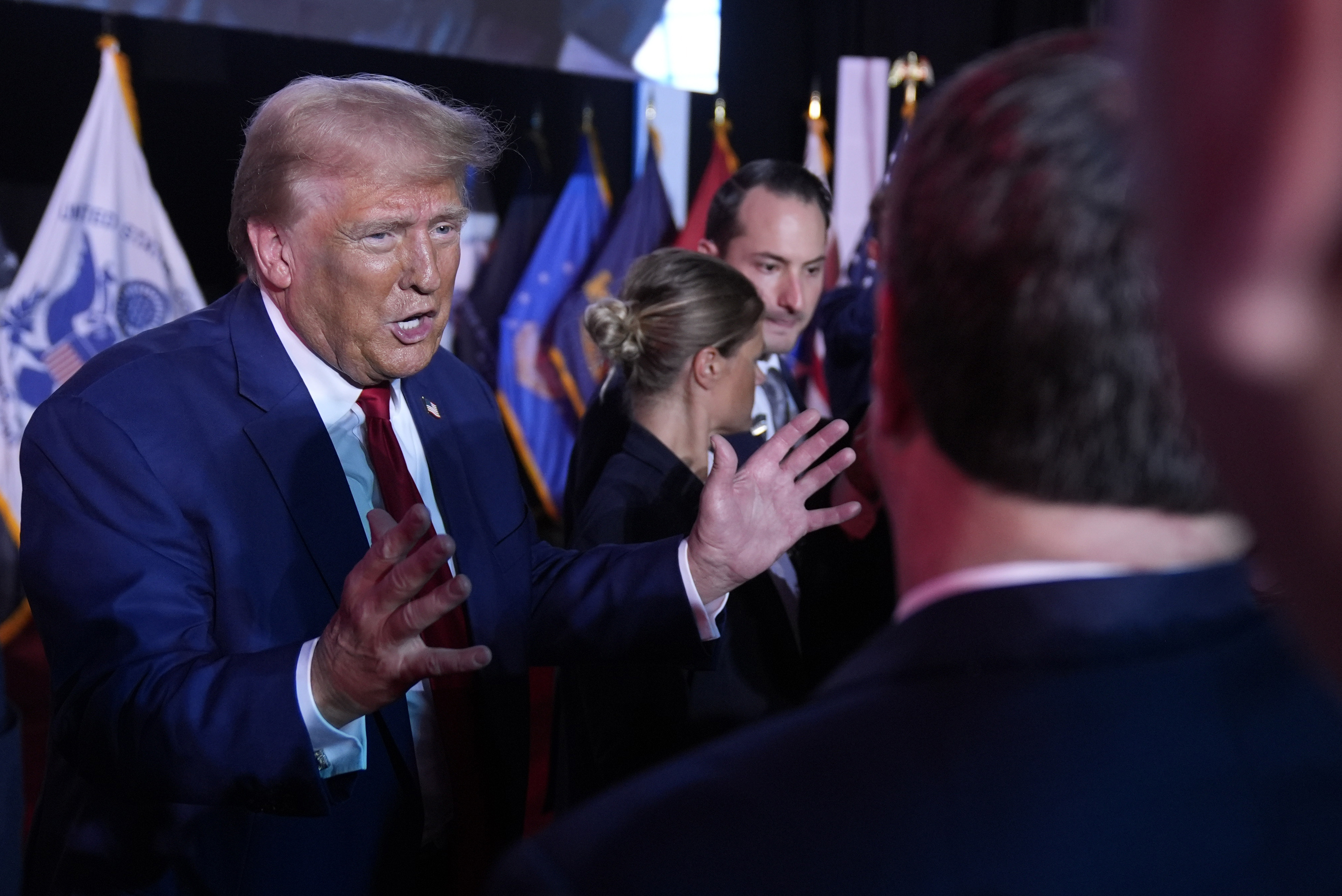 Republican presidential nominee former President Donald Trump talks with supporters at a campaign town hall Friday, Oct. 4, 2024, in Fayetteville, N.C. (AP Photo/Evan Vucci)