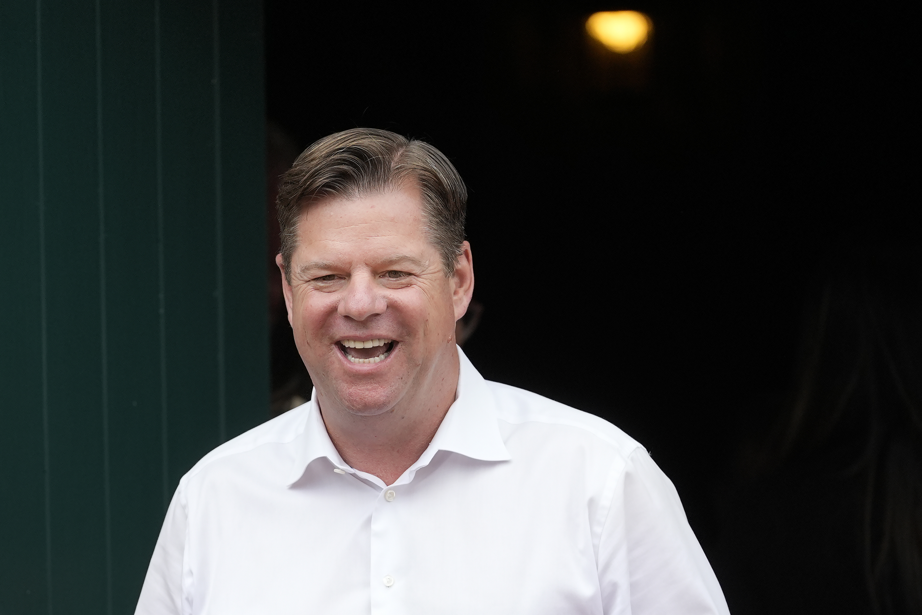 FILE - San Francisco mayoral candidate Mark Farrell smiles while meeting with people at a neighborhood event in San Francisco, Saturday, Sept. 21, 2024. (AP Photo/Jeff Chiu, File)