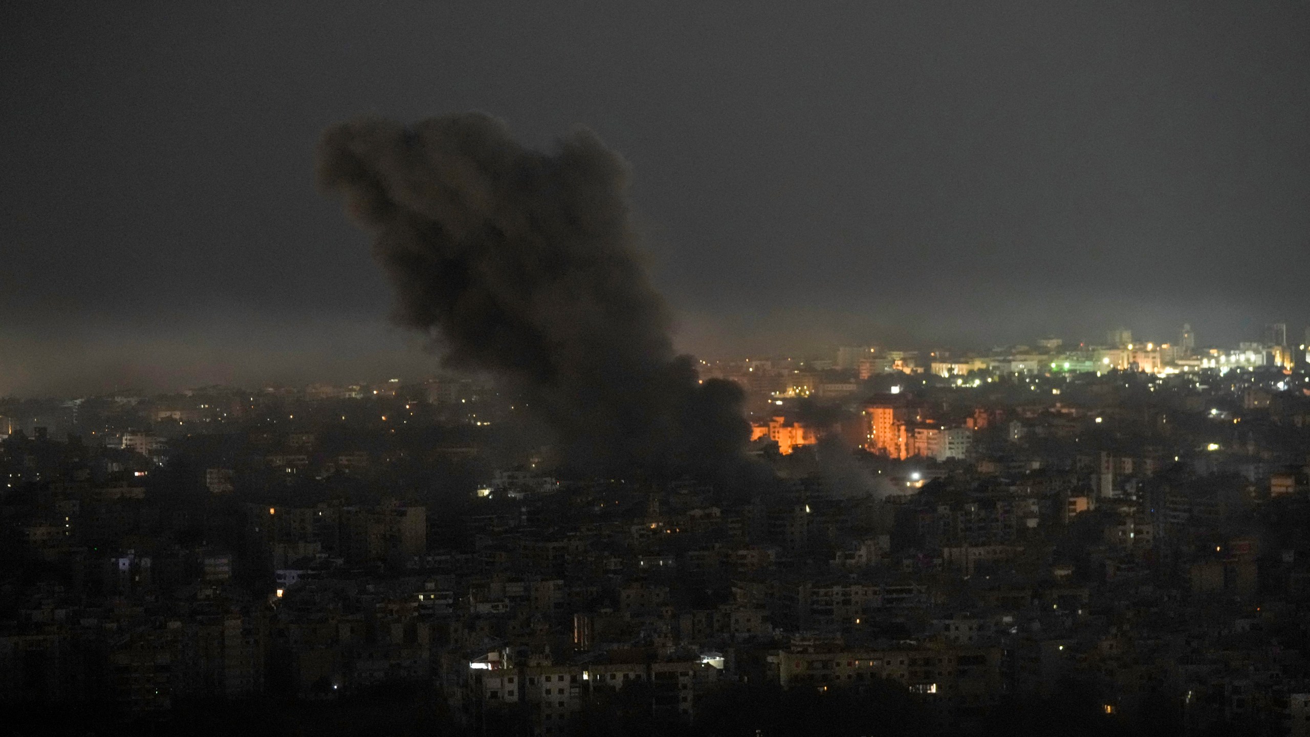 Smoke rises after Israeli airstrikes in Dahiyeh, Beirut, Lebanon, Saturday, Oct. 5, 2024. (AP Photo/Bilal Hussein)