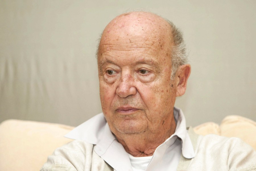 Greek composer Mimis Plessas attends a news conference before a concert at the northern port city in Thessaloniki, Greece, Tuesday, Oct. 22, 2002. (AP Photo/Eurokinissi/Vasilis Ververidis)