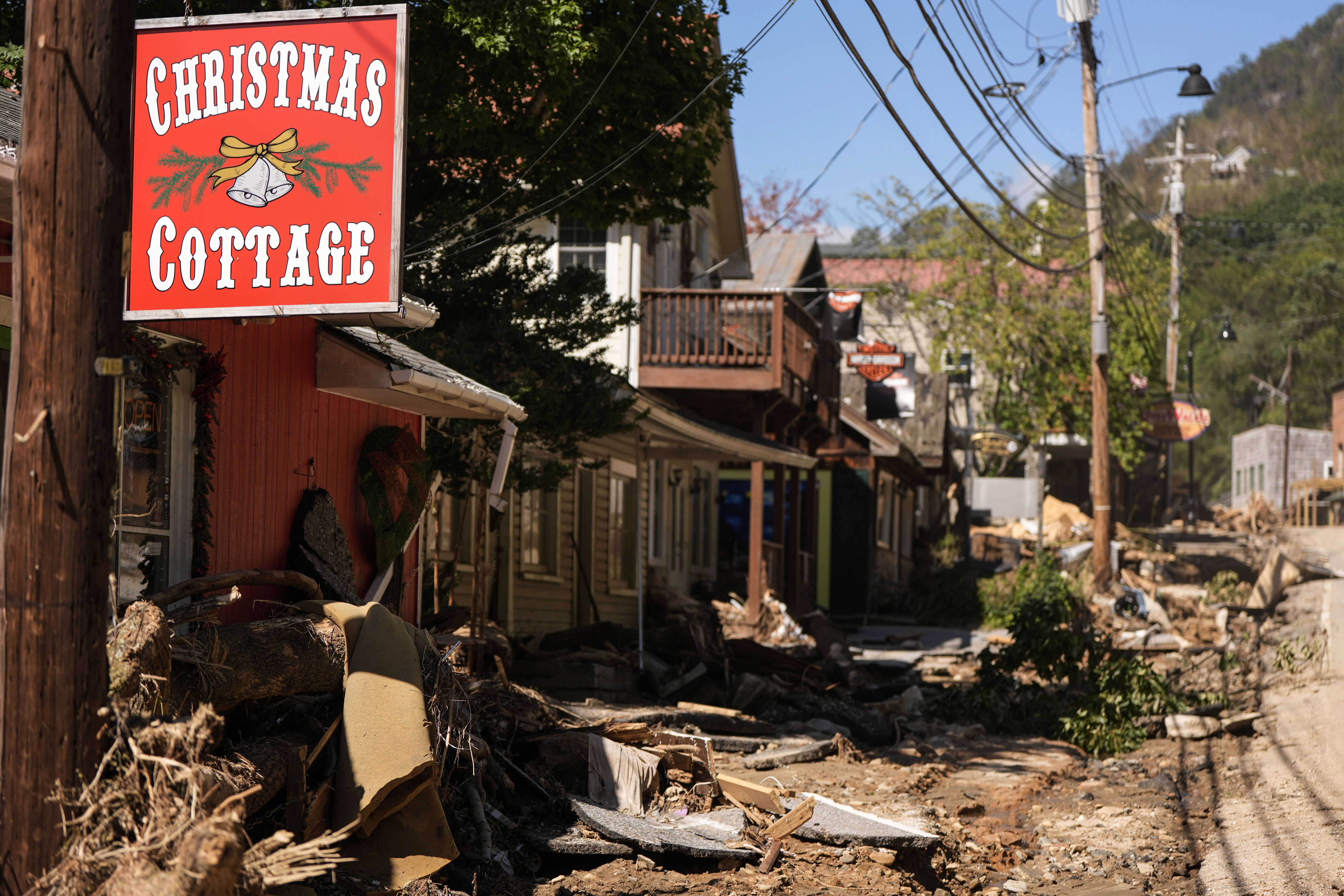 Business are seen in a debris field in the aftermath of Hurricane Helene, Wednesday, Oct. 2, 2024, in Chimney Rock Village, N.C. (AP Photo/Mike Stewart)