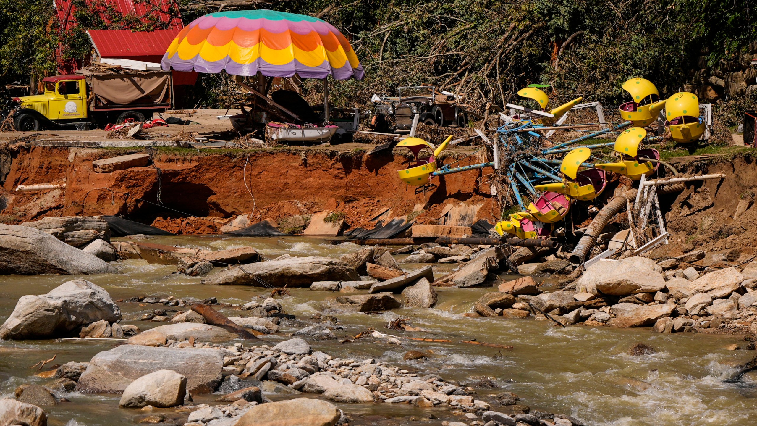 Debris is seen in the aftermath of Hurricane Helene, Wednesday, Oct. 2, 2024, in Chimney Rock Village, N.C. (AP Photo/Mike Stewart)