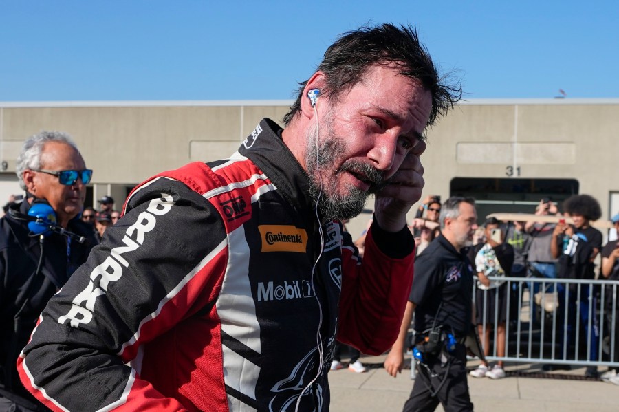 Keanu Reeves drives during the GR Cup Series auto race at Indianapolis Motor Speedway, Saturday, Oct. 5, 2024, in Indianapolis. (AP Photo/Darron Cummings)