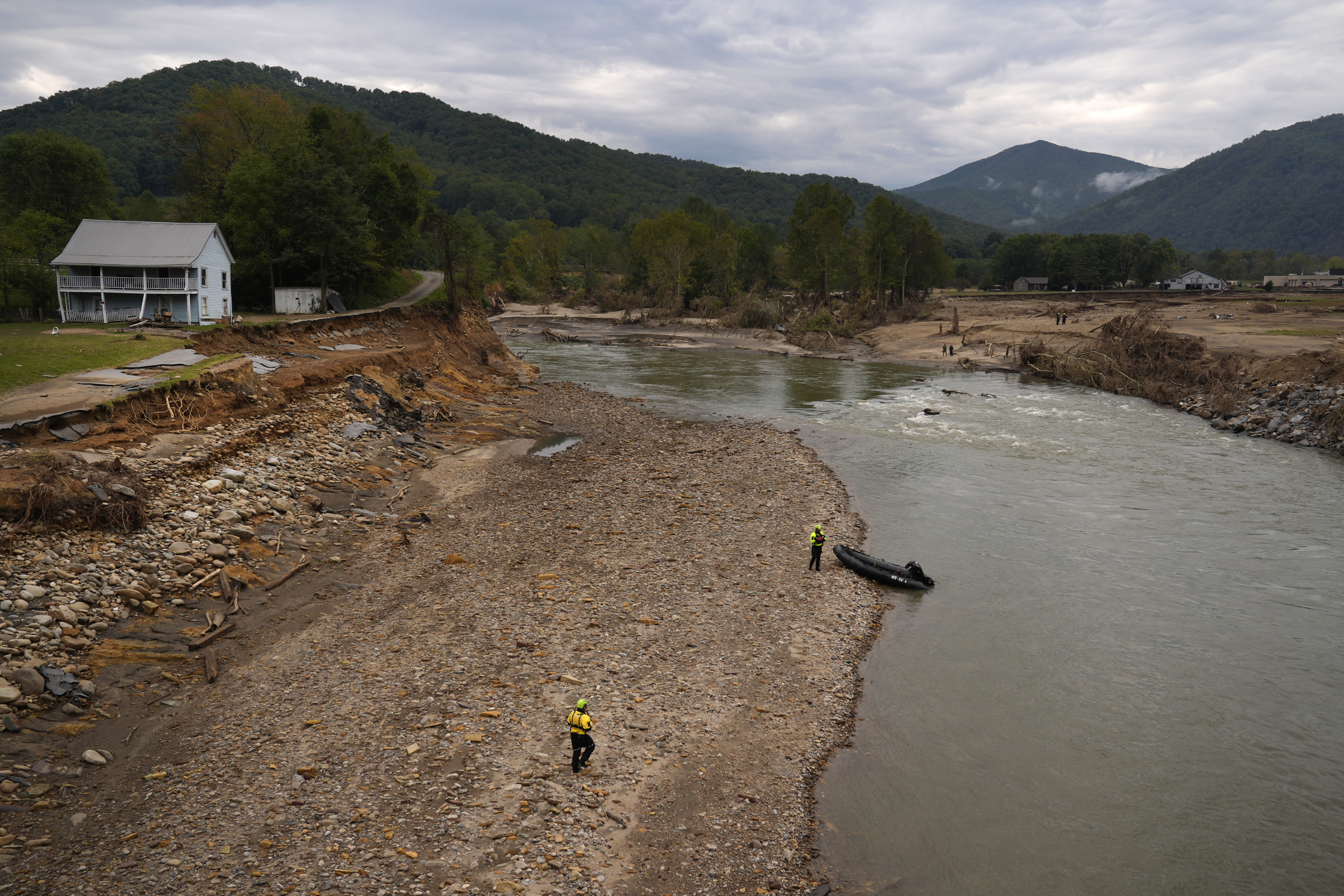 Personnel from Urban Search and Rescue Utah Task Force 1 search for victims of the Impact Plastics tragedy in the aftermath of Hurricane Helene Friday, Oct. 4, 2024, in Erwin, Tenn. (AP Photo/Jeff Roberson)