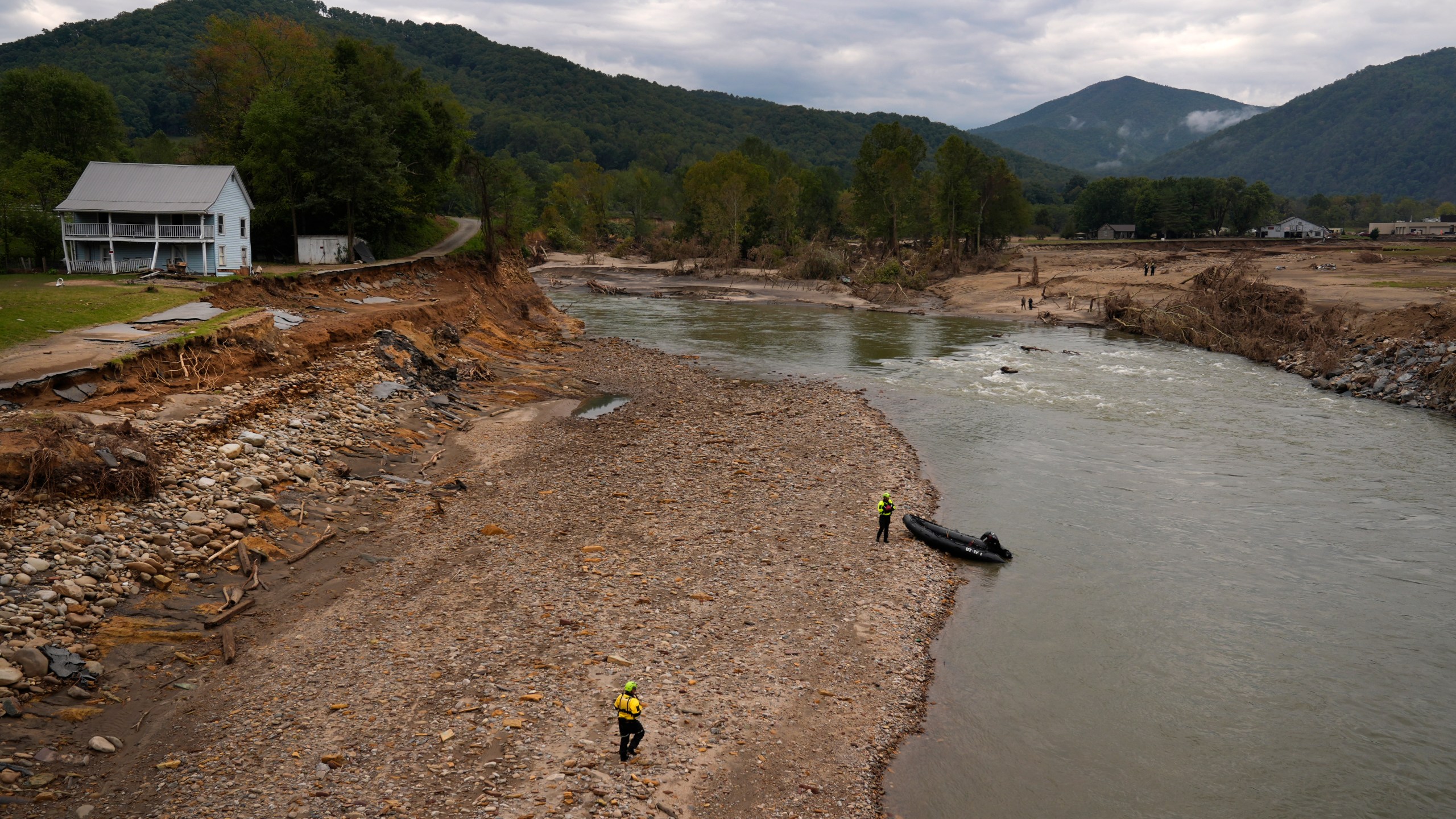 Personnel from Urban Search and Rescue Utah Task Force 1 search for victims of the Impact Plastics tragedy in the aftermath of Hurricane Helene Friday, Oct. 4, 2024, in Erwin, Tenn. (AP Photo/Jeff Roberson)