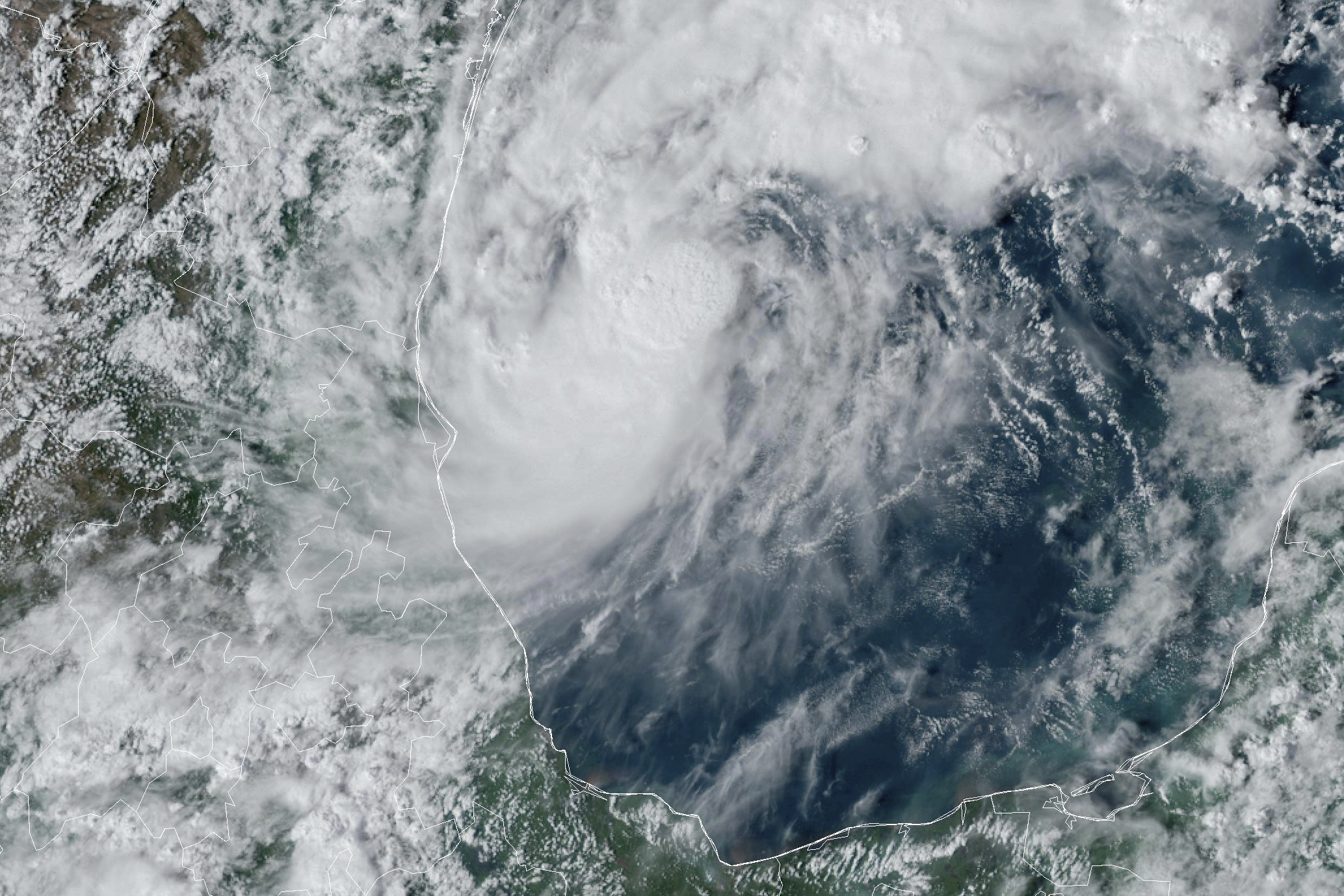 This GOES-16 GeoColor satellite image taken at 4:50 p.m. EDT and provided by National Oceanic and Atmospheric Administration (NOAA) shows Tropical Storm Milton, center, off the coast of Mexico in the Gulf of Mexico, Saturday, Oct. 5, 2024. (NOAA via AP)