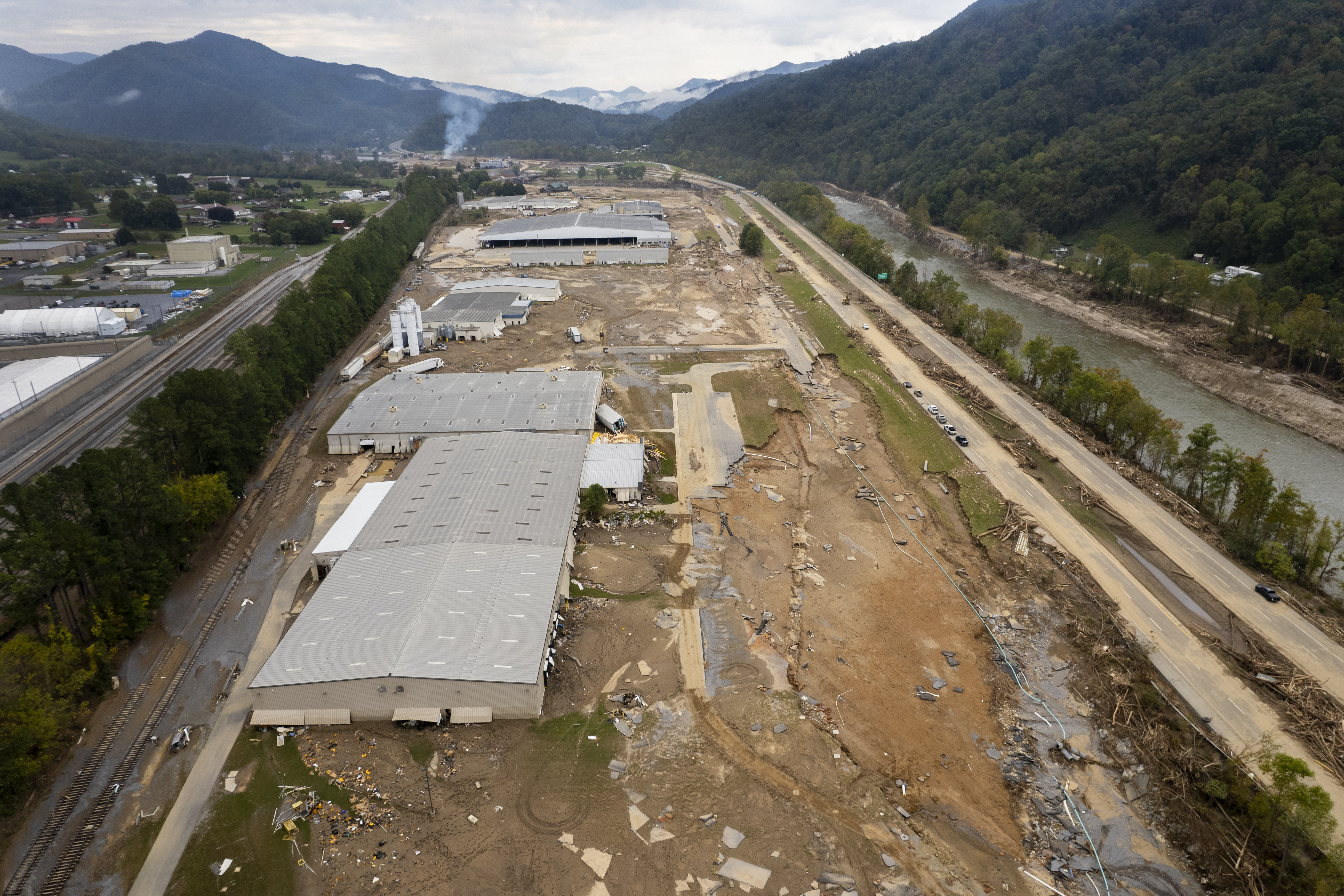 Damage caused by flooding from Hurricane Helene is seen around Impact Plastics in Erwin, Tenn., on Friday, Oct. 4, 2024. (AP Photo/Jeff Roberson)