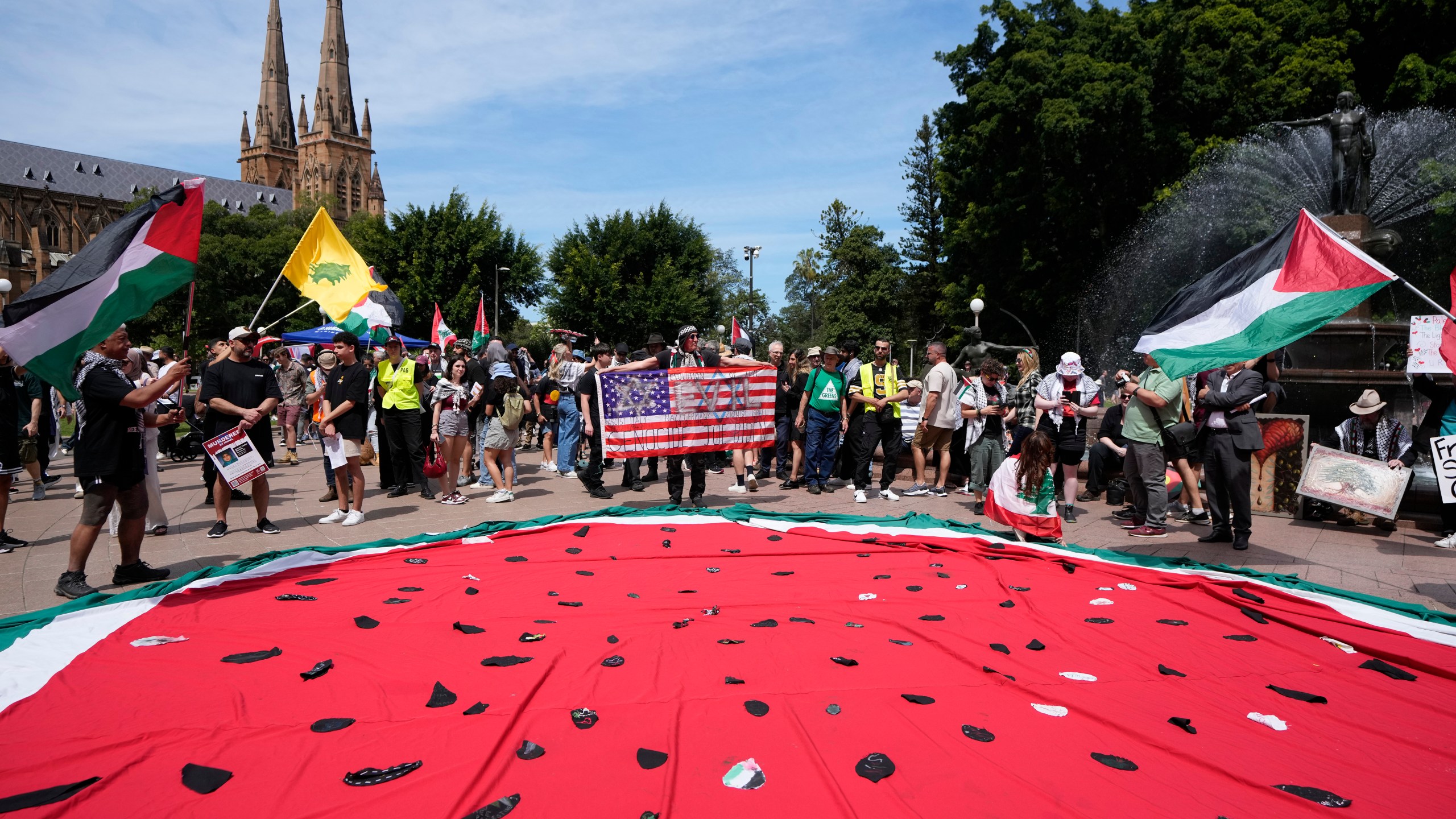 Pro-Palestinian supporters rally in Sydney, Sunday, Oct. 6, 2024. (AP Photo/Rick Rycroft)