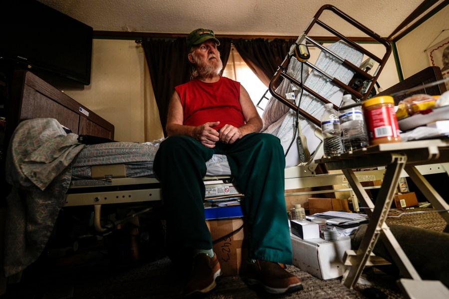 Cliff Stewart, who survived a flash flood whilst in a hospital bed, is seen in the aftermath of Hurricane Helene, Tuesday, Oct. 1, 2024, in Swannanoa, N.C. (AP Photo/Mike Stewart)