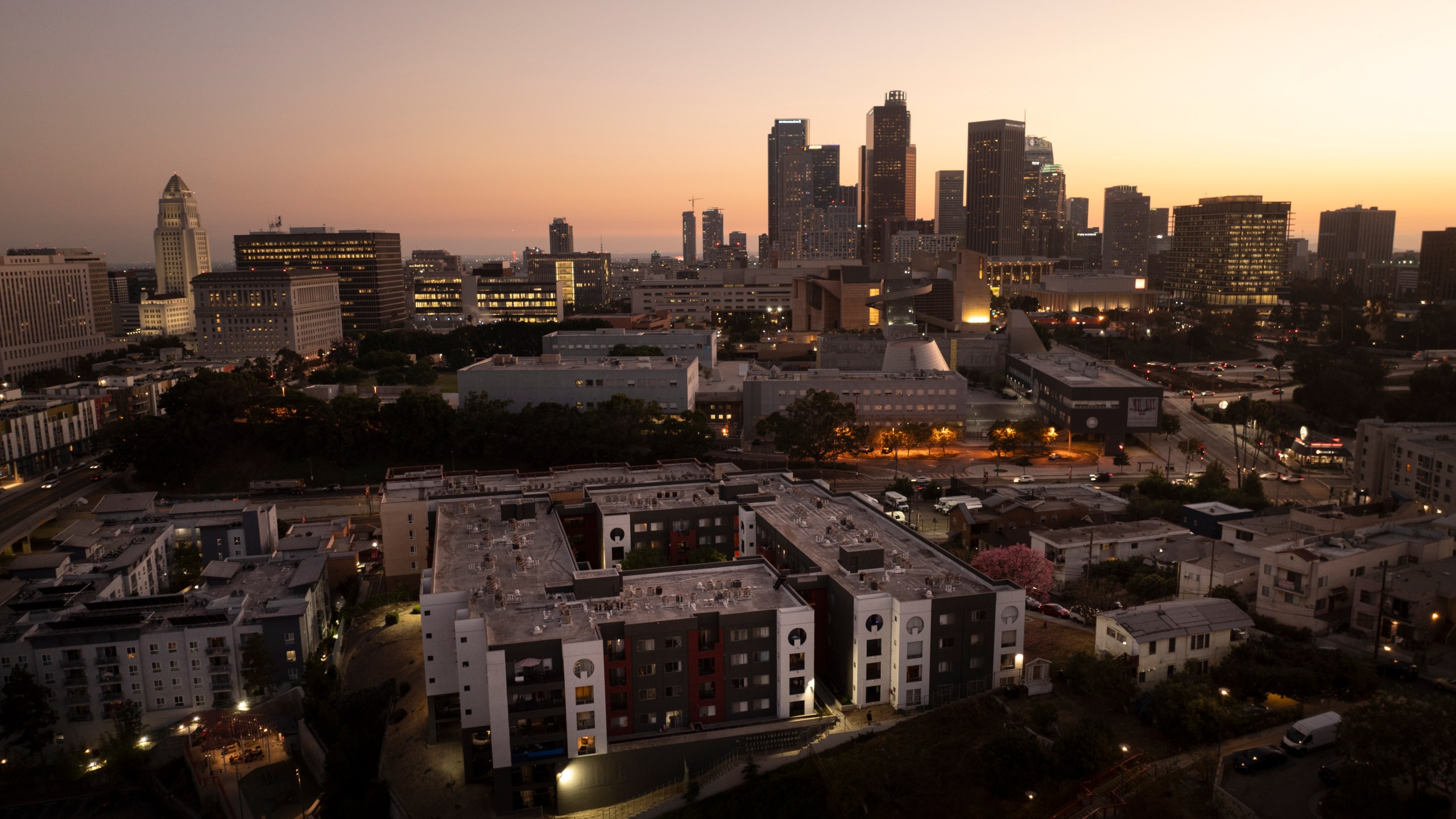 An aerial view shows Hillside Villa, bottom center, an apartment complex where Marina Maalouf is a longtime tenant, in Los Angeles, Tuesday, Oct. 1, 2024. (AP Photo/Jae C. Hong)