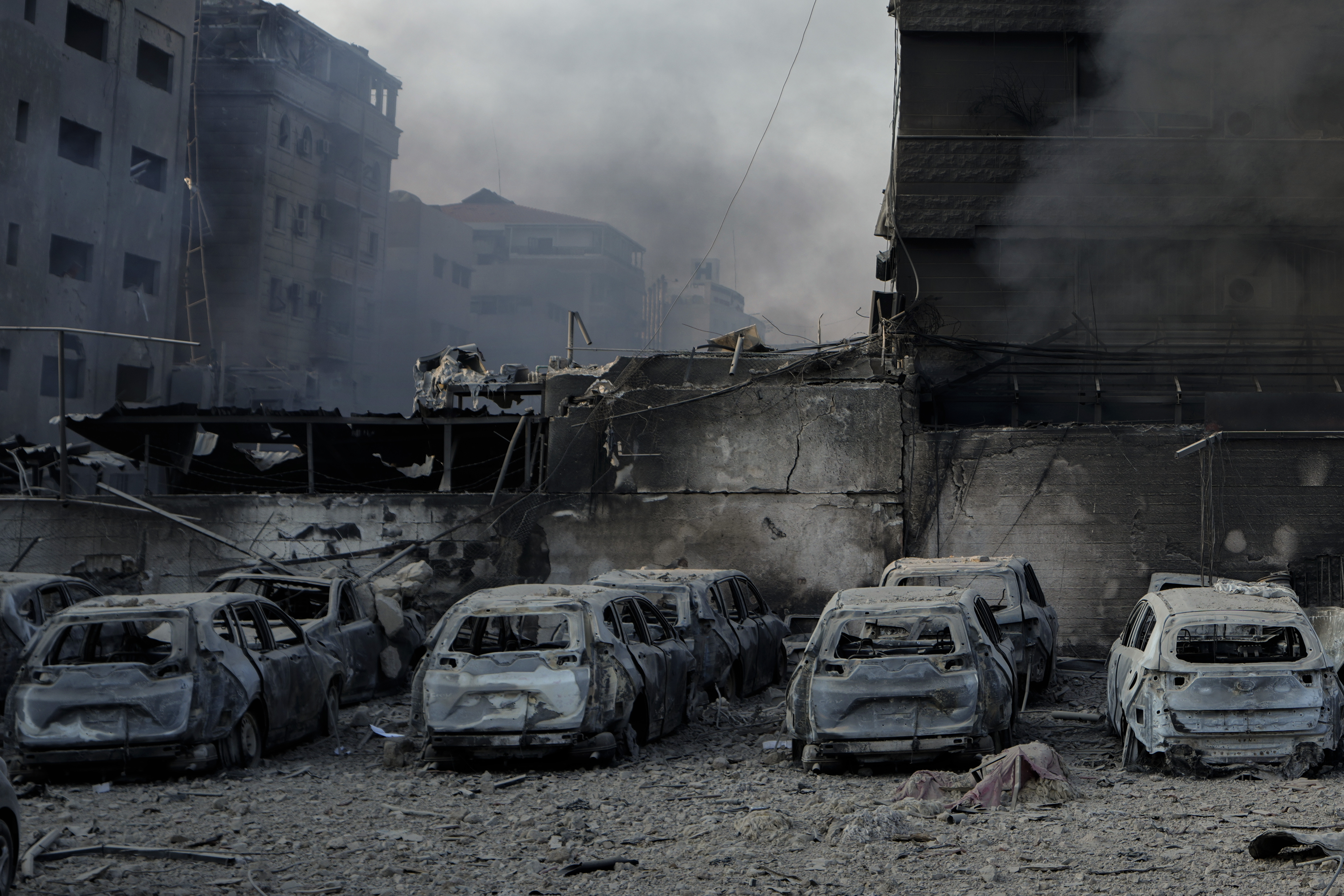 Charred cars at the site of an Israeli airstrike in Dahiyeh, Beirut, Lebanon, Sunday, Oct. 6, 2024. (AP Photo/Bilal Hussein)