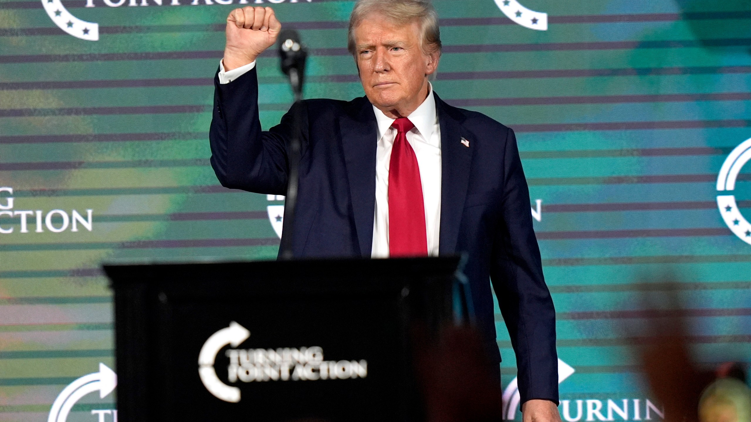 FILE - Republican presidential candidate former President Donald Trump gestures as he finishes speaking at The Believers' Summit 2024 at a Turning Point Action event in West Palm Beach, Fla., July 26, 2024. (AP Photo/Lynne Sladky, File)