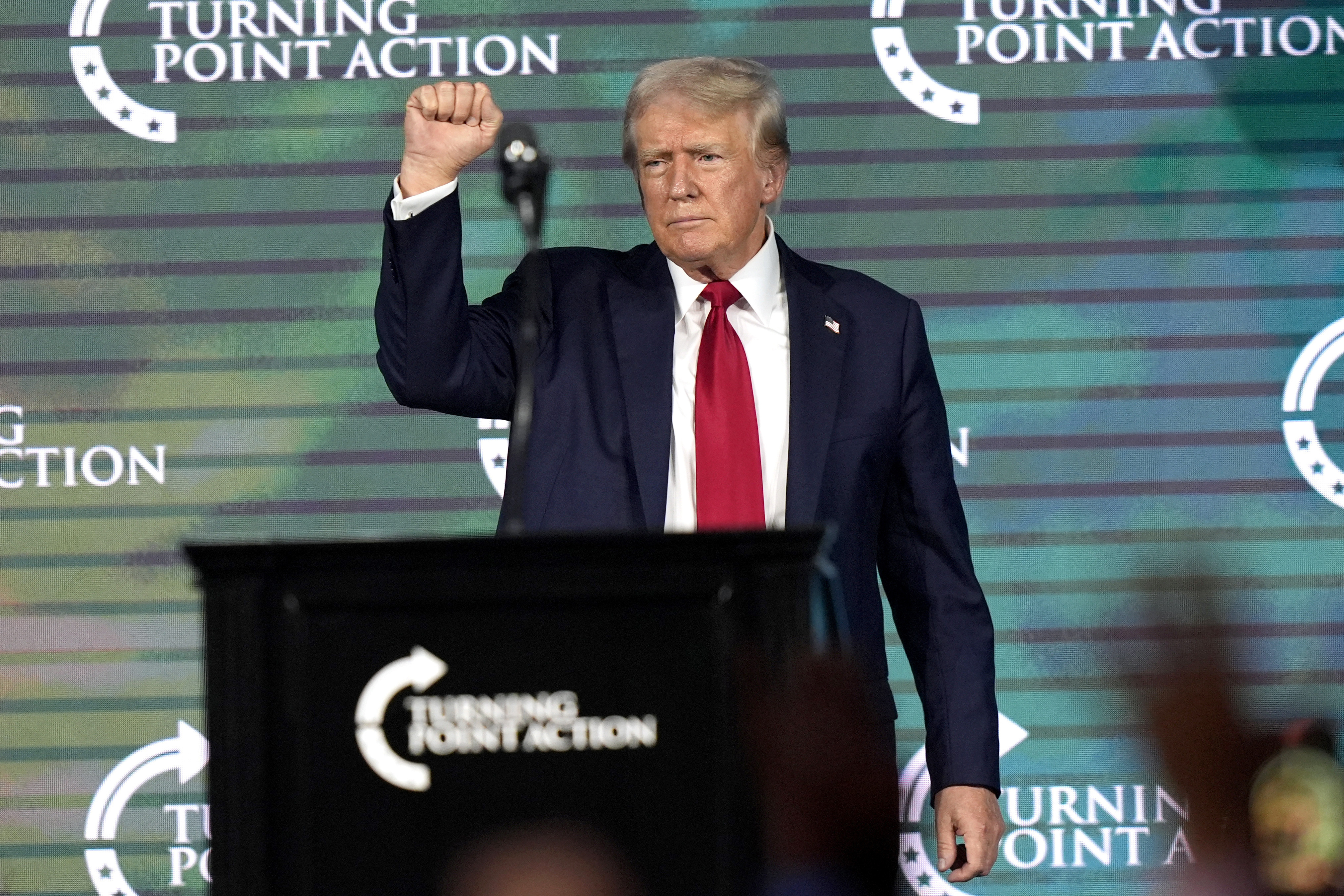 FILE - Republican presidential candidate former President Donald Trump gestures as he finishes speaking at The Believers' Summit 2024 at a Turning Point Action event in West Palm Beach, Fla., July 26, 2024. (AP Photo/Lynne Sladky, File)