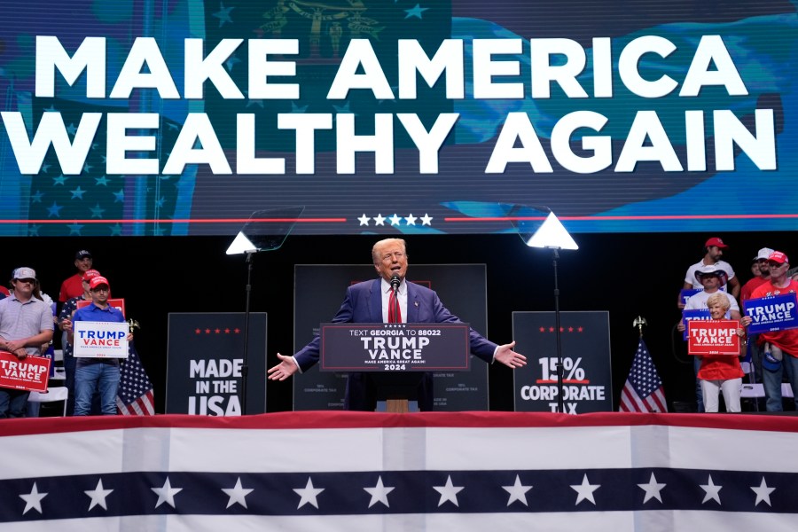 FILE - Republican presidential nominee former President Donald Trump speaks about the tax code and manufacturing, Sept. 24, 2024, in Savannah, Ga. (AP Photo/Evan Vucci, File)