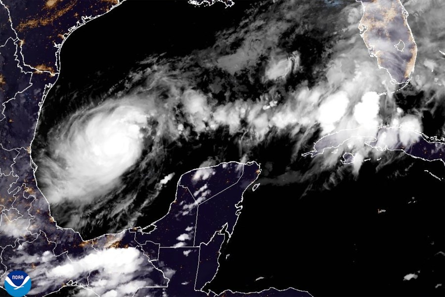 This satellite image from the National Oceanic and Atmospheric Administration taken at 7:41pm ET on Sunday, Oct. 6, 2024, shows Hurricane Milton, which quickly intensified Sunday and is on track to become a major hurricane with the Tampa Bay, Fla., area in its sights. (NOAA via AP)