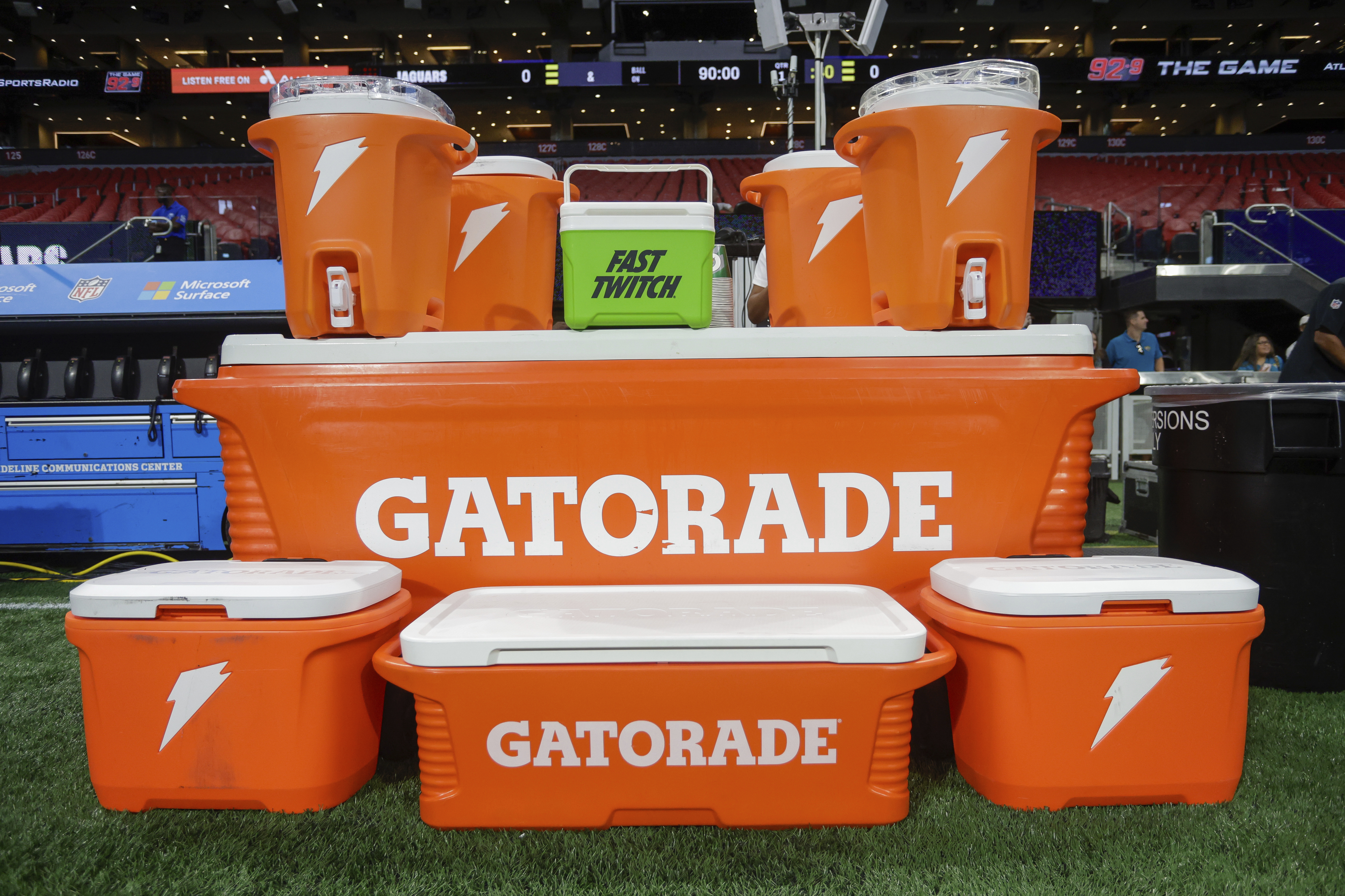 FILE - Gatorade containers are shown on the sideline prior to an NFL preseason football game between the Jacksonville Jaguars and Atlanta Falcons, Aug. 23, 2024, in Atlanta. (AP Photo/Stew Milne, File)