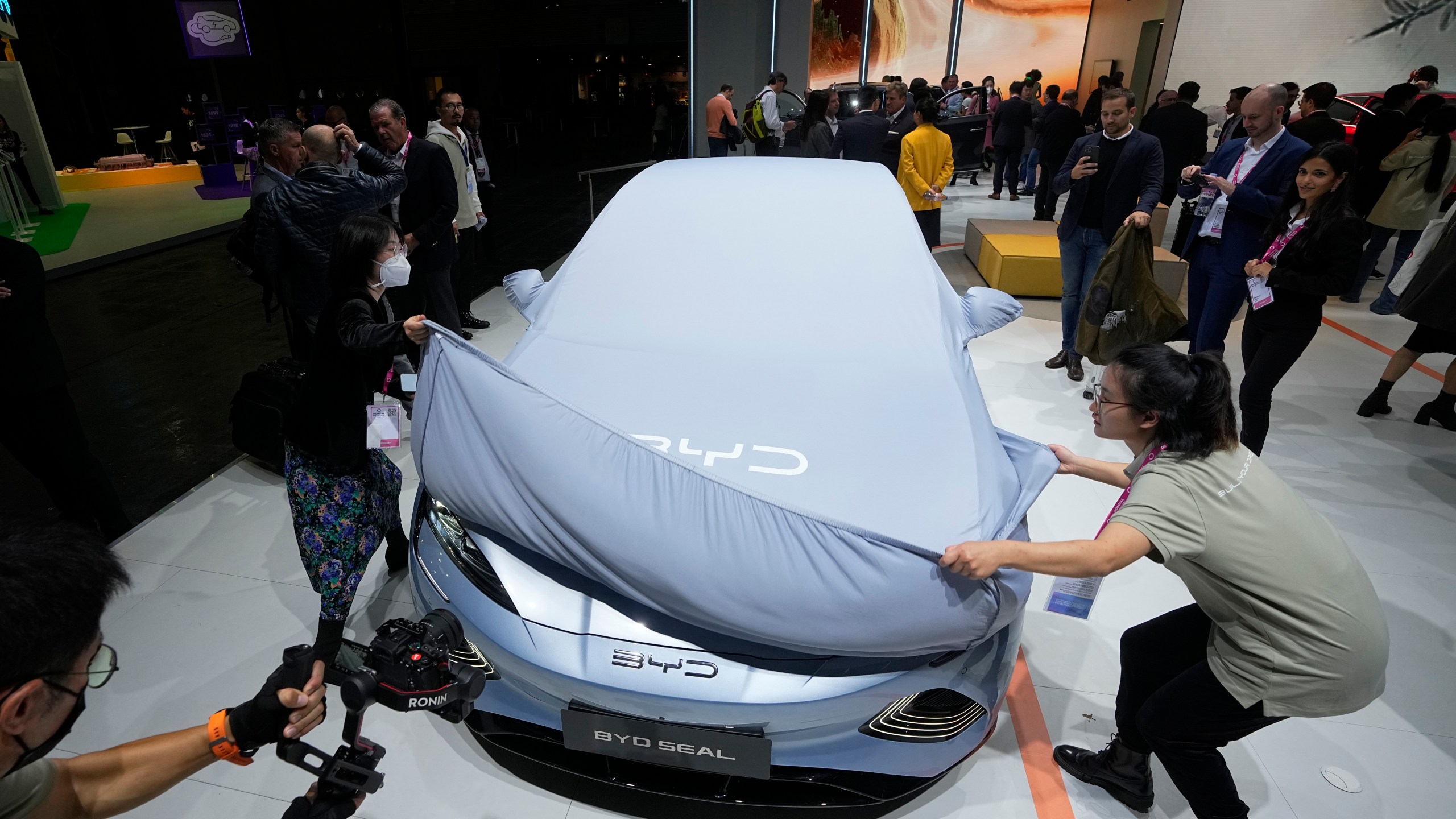 FILE - Chinese EV manufacturer BYD unveils its electric car Seal at the Paris Car Show on Oct. 17, 2022, in Paris. (AP Photo/Michel Euler, File)