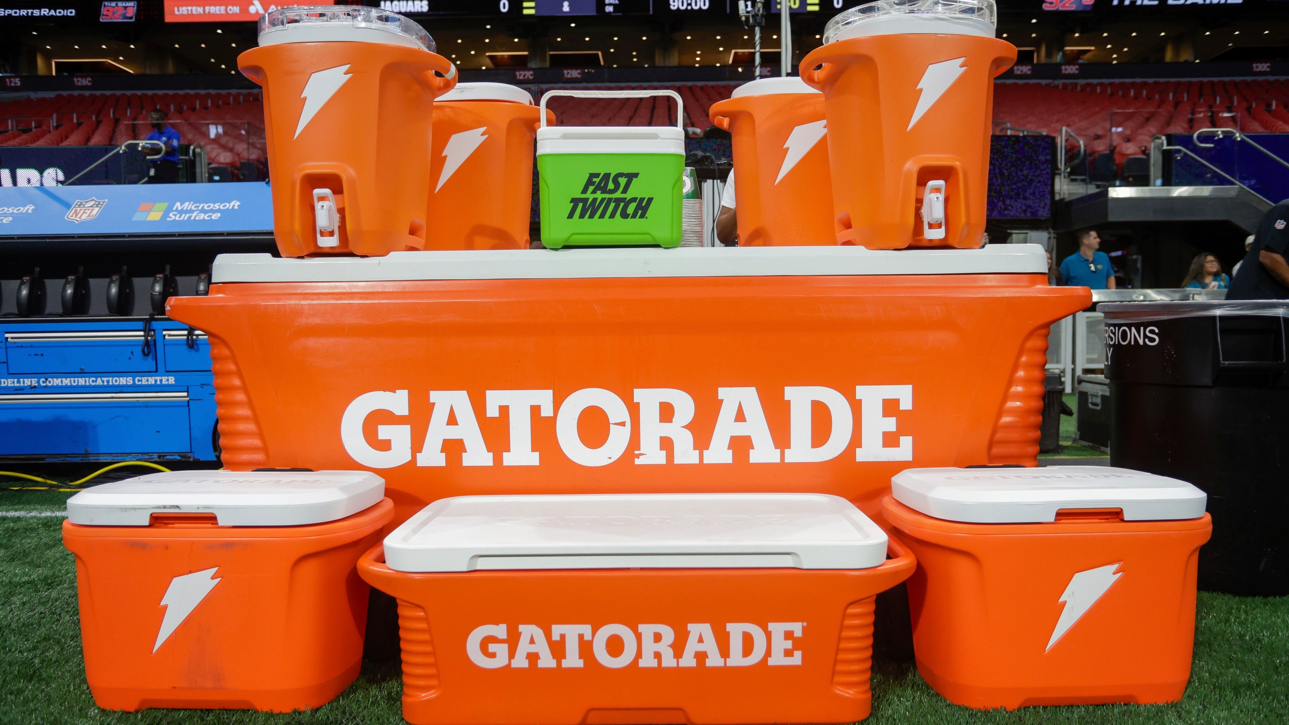 FILE - Gatorade containers are shown on the sideline prior to an NFL preseason football game between the Jacksonville Jaguars and Atlanta Falcons, Aug. 23, 2024, in Atlanta. (AP Photo/Stew Milne, File)