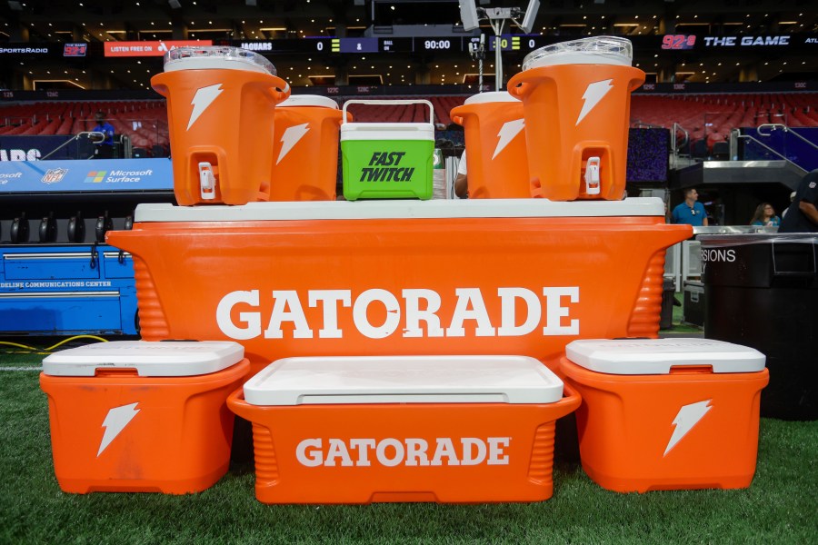 FILE - Gatorade containers are shown on the sideline prior to an NFL preseason football game between the Jacksonville Jaguars and Atlanta Falcons, Aug. 23, 2024, in Atlanta. (AP Photo/Stew Milne, File)