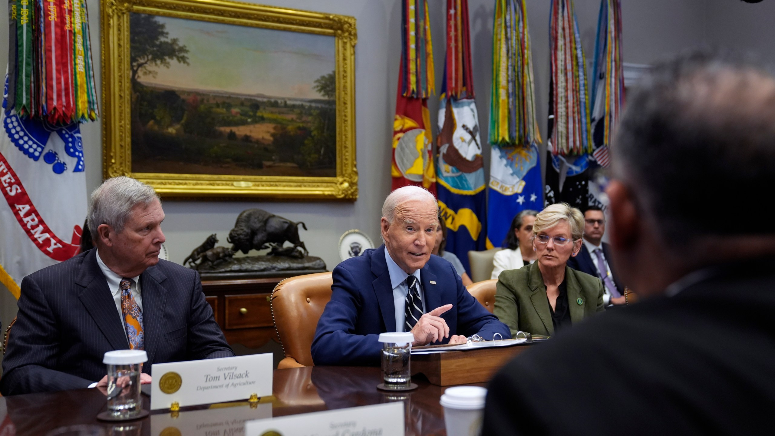 President Joe Biden delivers remarks on the federal government's response to Hurricane Helene and preparations for Hurricane Milton in the Roosevelt Room of the White House, Tuesday, Oct. 8, 2024, in Washington, as Secretary of Agriculture Tom Vilsack, left, and Secretary of Energy Jennifer Granholm, right, look on. (AP Photo/Evan Vucci)