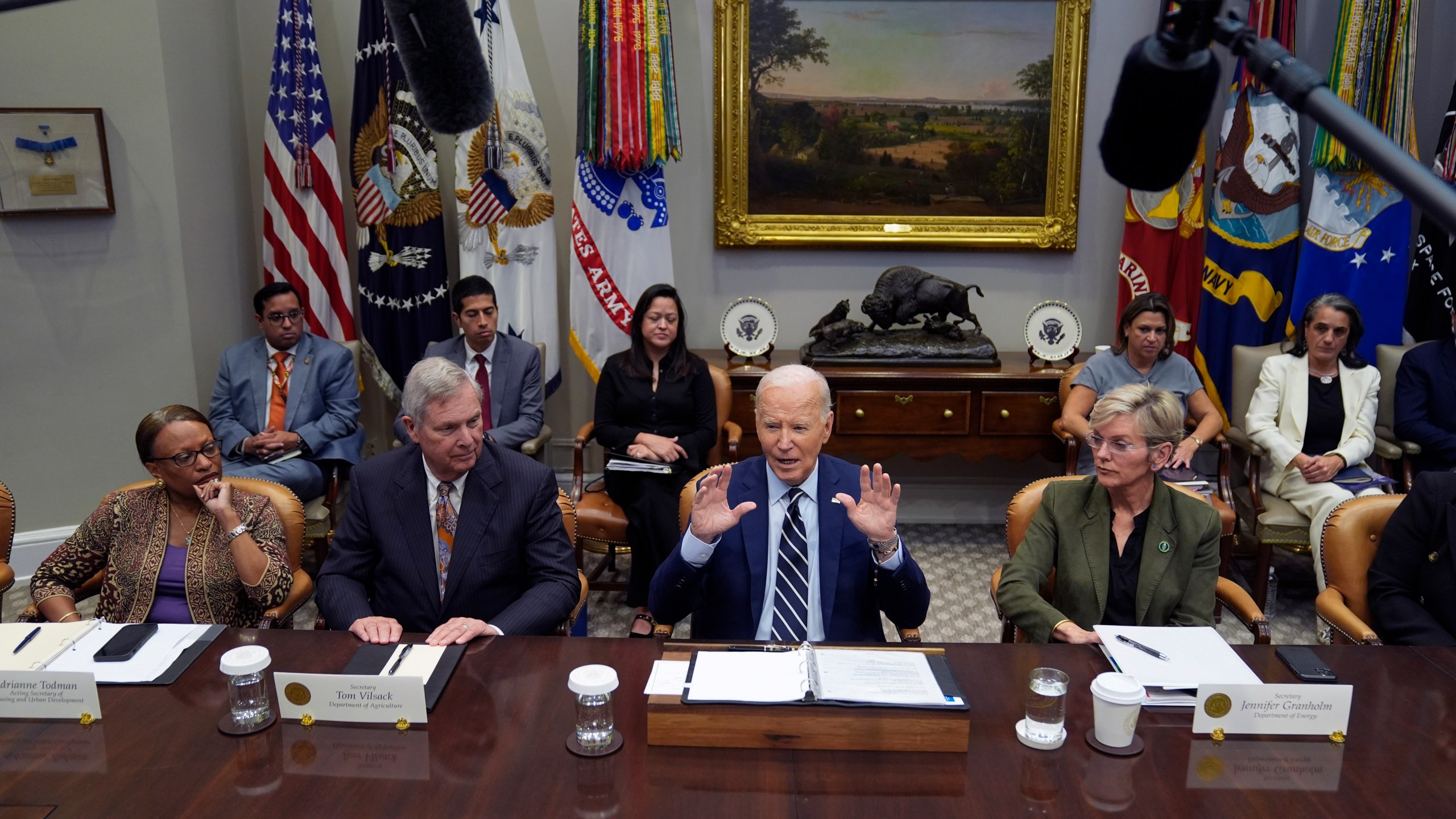 President Joe Biden delivers remarks on the federal government's response to Hurricane Helene and preparations for Hurricane Milton in the Roosevelt Room of the White House, Tuesday, Oct. 8, 2024, in Washington, as from seated left, Acting Secretary of Housing and Urban Development Adrianne Todman, Secretary of Agriculture Tom Vilsack, Biden, and Secretary of Energy Jennifer Granholm, right, look on. (AP Photo/Evan Vucci)