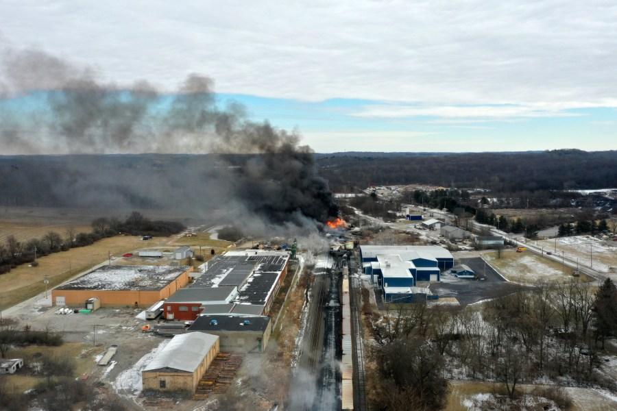 FILE - This photo taken with a drone shows portions of a Norfolk Southern freight train that derailed in East Palestine, Ohio, Feb. 4, 2023. (AP Photo/Gene J. Puskar, File)