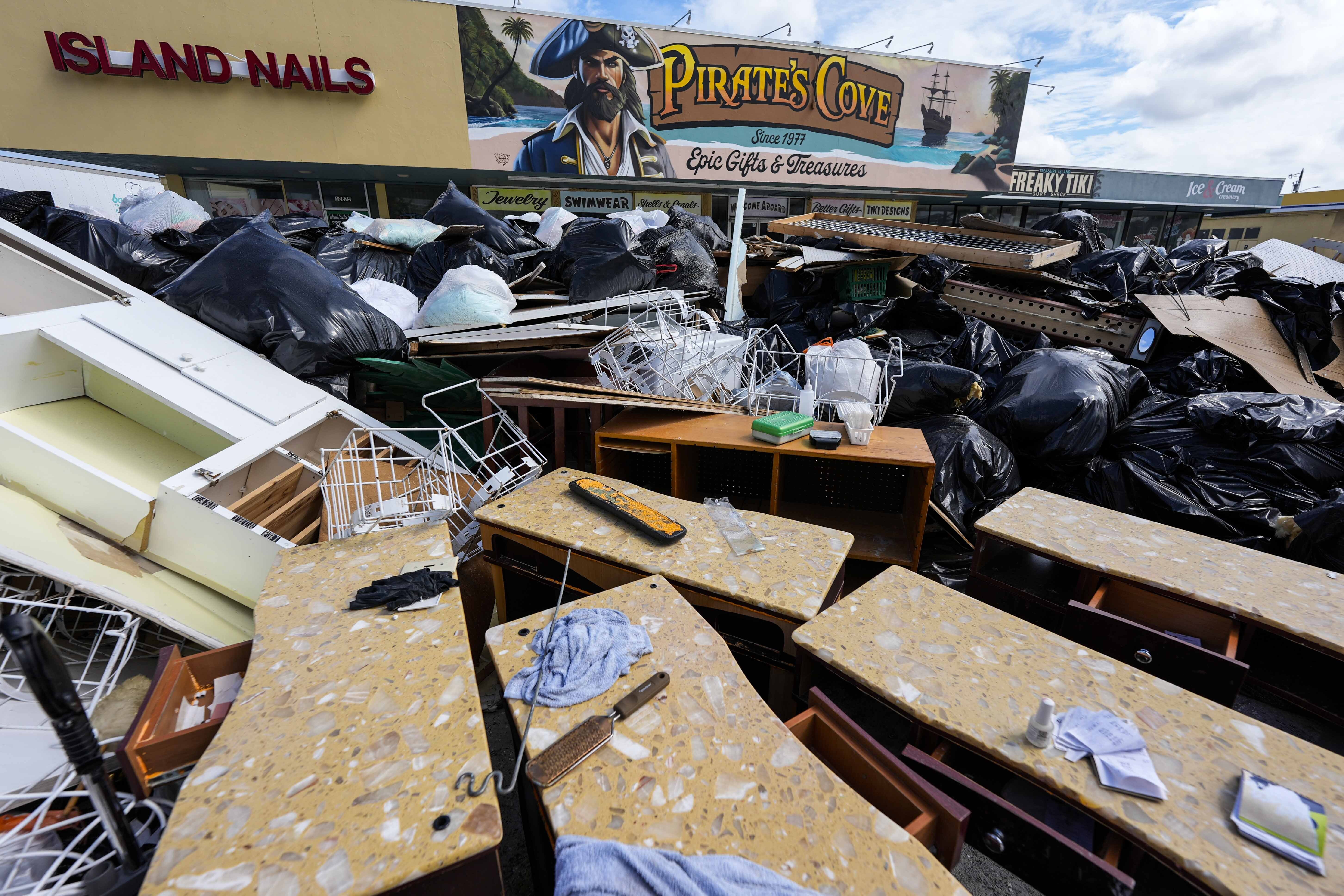 A closed business is seen after Hurricane Helene ahead of Hurricane Milton's arrival, Tuesday, Oct. 8, 2024, in Treasure Island, Fla. (AP Photo/Mike Stewart)