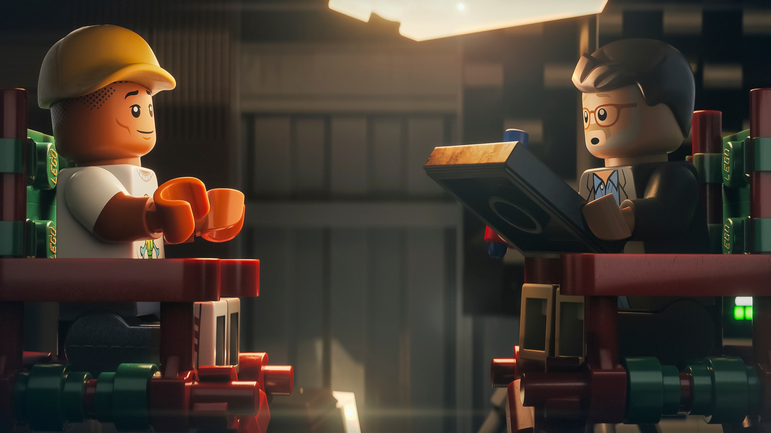 This image released by Focus Features shows lego characters Pharrell Williams, left, and director Morgan Neville in a scene from "Piece By Piece." (Focus Features via AP)