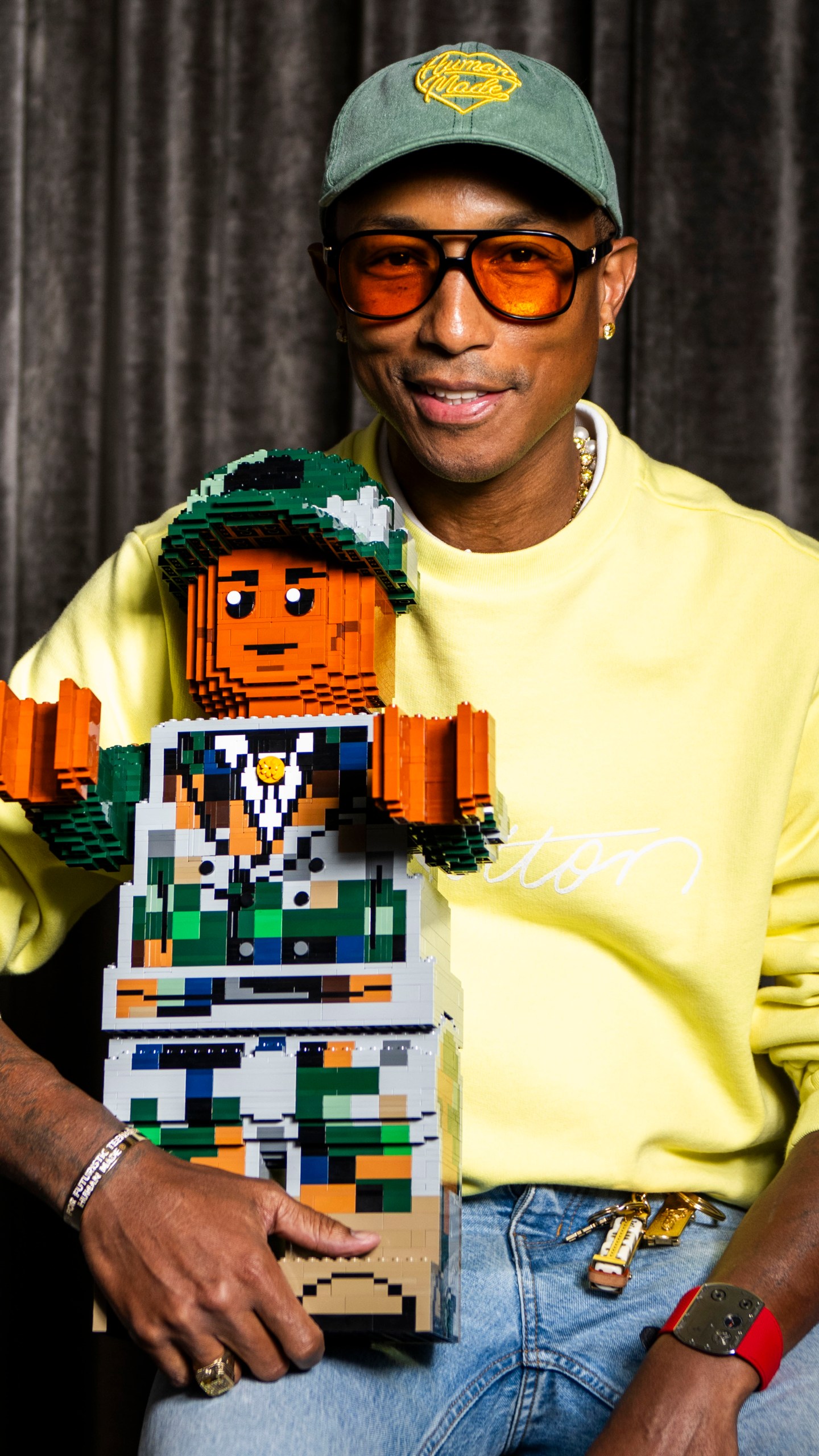 Pharrell Williams poses for a portrait to promote the film "Piece by Piece" during the Toronto International Film Festival, Monday, Sept. 9, 2024, in Toronto. (Photo by Arthur Mola/Invision/AP)