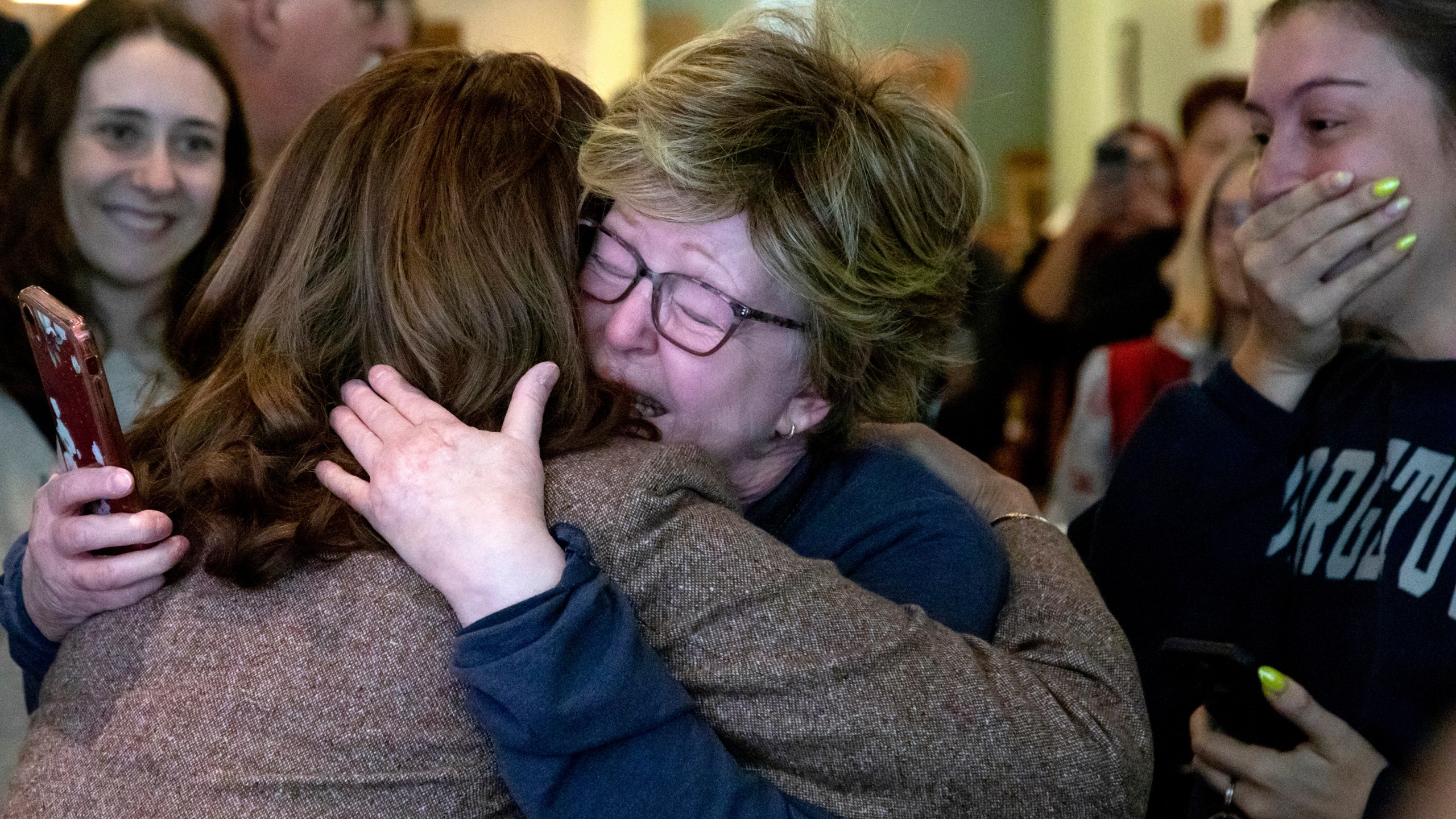 FILE - Democratic presidential nominee Vice President Kamala Harris, left, hugs a supporter during a campaign stop at Penzeys Spices, Saturday, Sept. 7, 2024, in Pittsburgh. (AP Photo/Rebecca Droke, File)