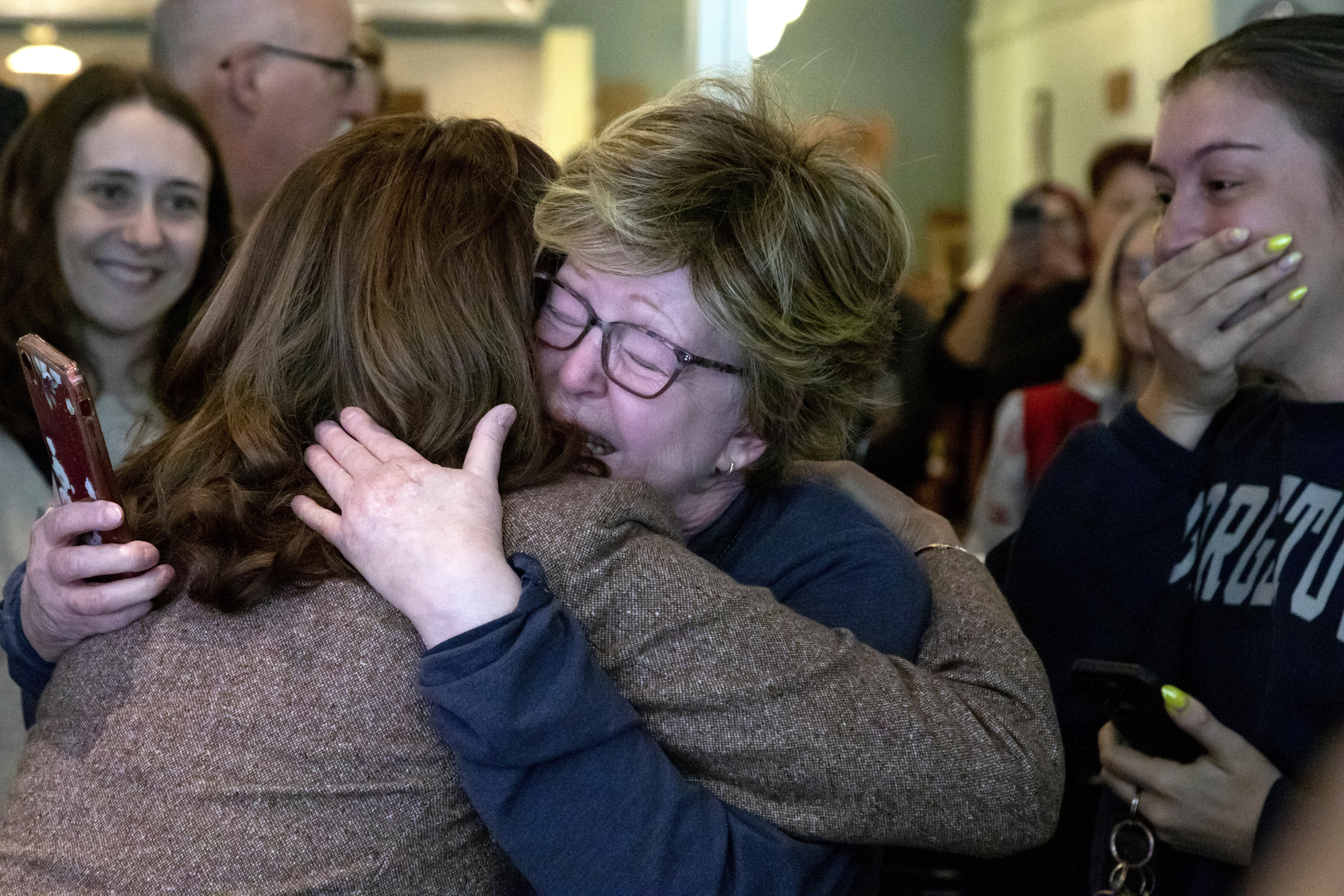 FILE - Democratic presidential nominee Vice President Kamala Harris, left, hugs a supporter during a campaign stop at Penzeys Spices, Saturday, Sept. 7, 2024, in Pittsburgh. (AP Photo/Rebecca Droke, File)