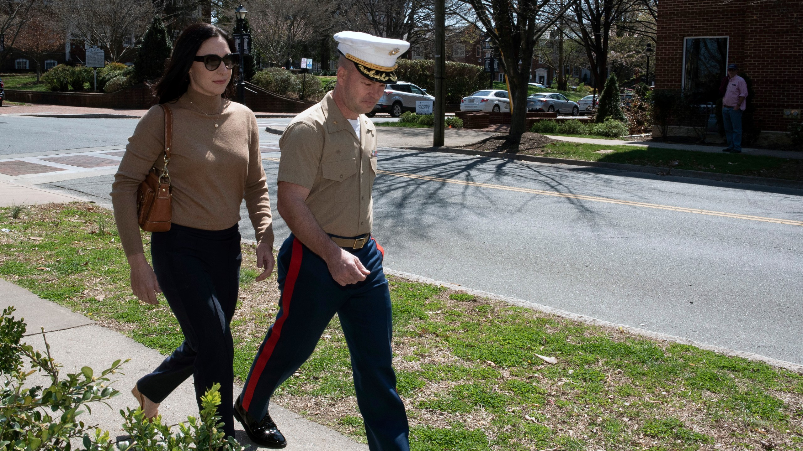 FILE - Marine Maj. Joshua Mast and his wife, Stephanie, arrive at Circuit Court for a hearing in an ongoing custody battle over an Afghan orphan, March 30, 2023, in Charlottesville, Va. (AP Photo/Cliff Owen, File)