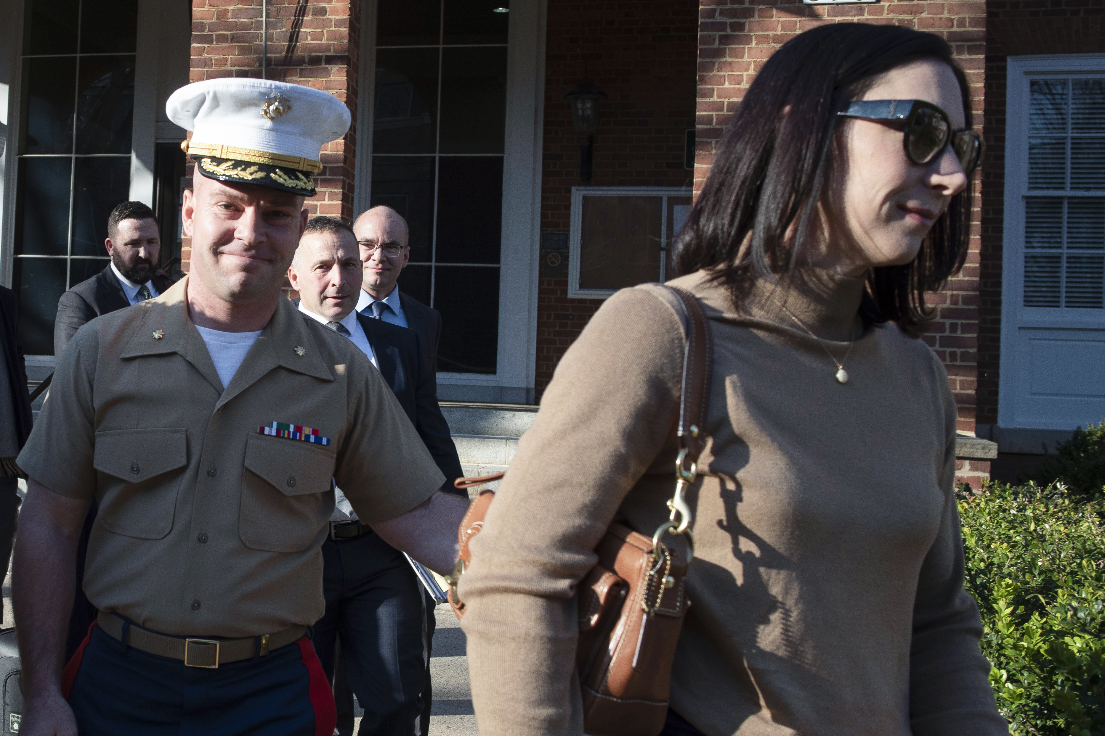 FILE - Marine Maj. Joshua Mast and his wife, Stephanie, walk out of Circuit Court, March 30, 2023 in Charlottesville, Va. A Virginia appellate court ruled Tuesday that a U.S. Marine should never have been granted an adoption of an Afghan war orphan and voided the custody order he’s relied on to raise the girl for nearly three years. The decision marked a major turning point in a bitter custody battle that has international ramifications far greater than the fate of one child. (AP Photo/Cliff Owen, File)