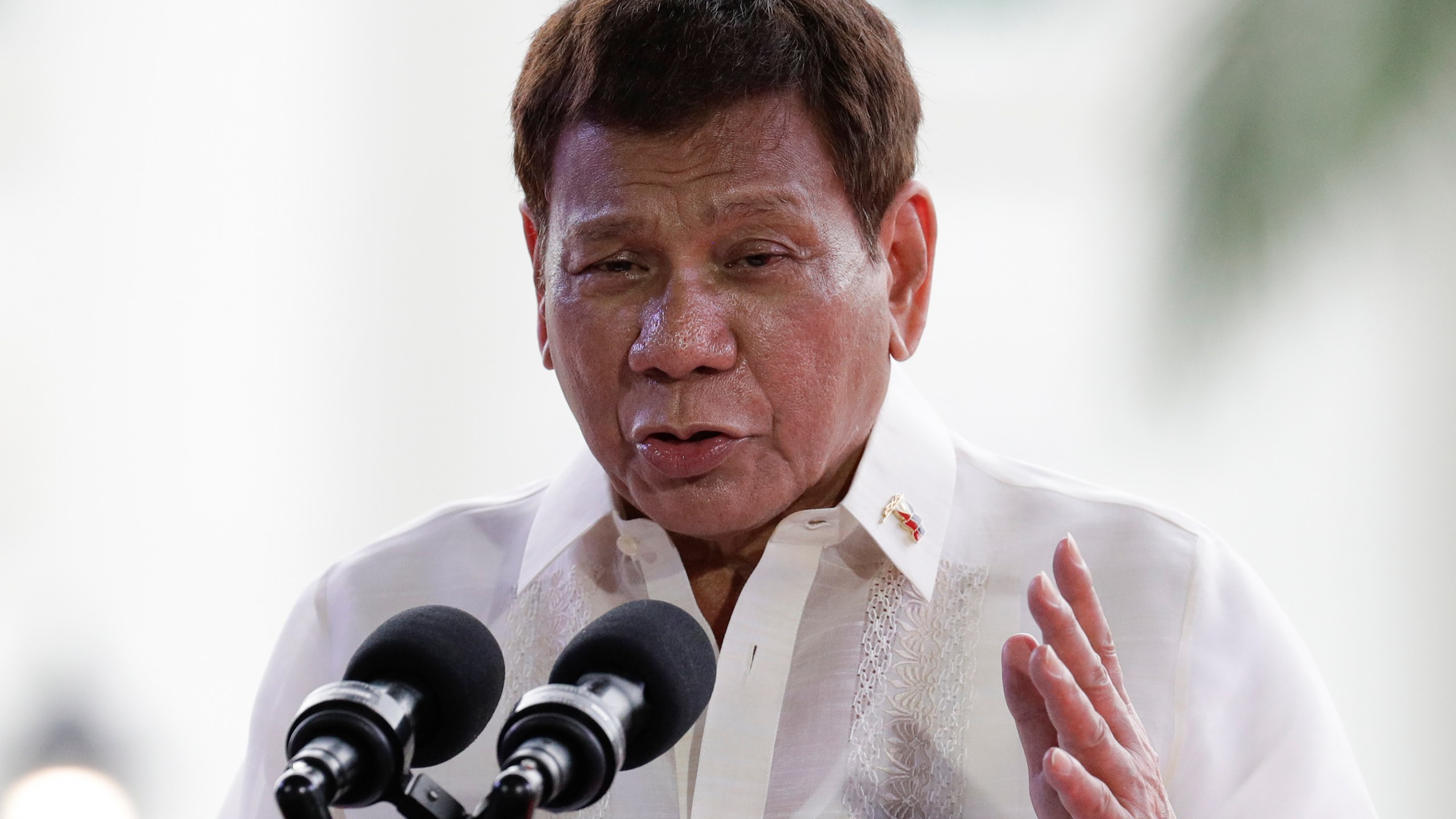 FILE - Philippine President Rodrigo Duterte gestures during a speech at the anniversary of the proclamation of the Philippine independence rites on Saturday, June 12, 2021, at the Provincial Capitol of Bulacan province, Philippines. (AP Photo/Aaron Favila, file)