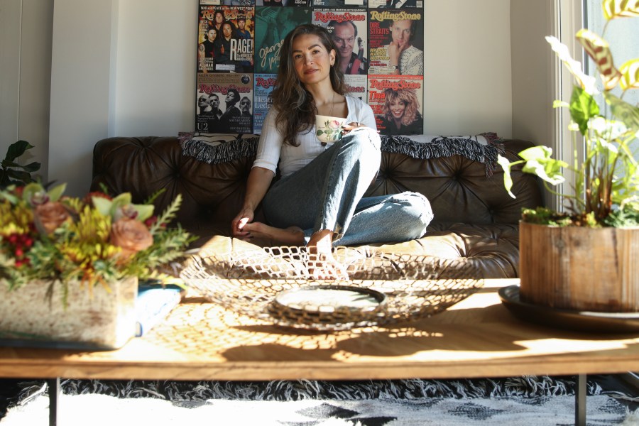 Headspace meditation teacher Rosie Acosta poses for a portrait in her living room, Monday, Sept. 30, 2024, in Woodland Hills, Calif. (AP Photo/Jessie Alcheh)