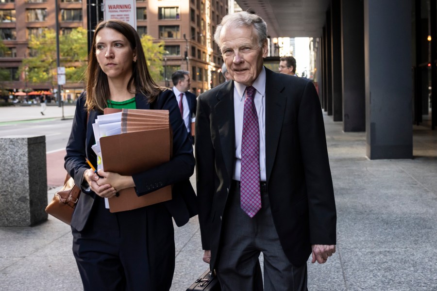 Illinois' former House Speaker Michael Madigan, charged in a multimillion-dollar racketeering and bribery scheme that included the state’s largest utility, ComEd, walks out of the Dirksen Federal Courthouse, Wednesday, Oct. 9, 2024 in Chicago. (Ashlee Rezin/Chicago Sun-Times via AP)