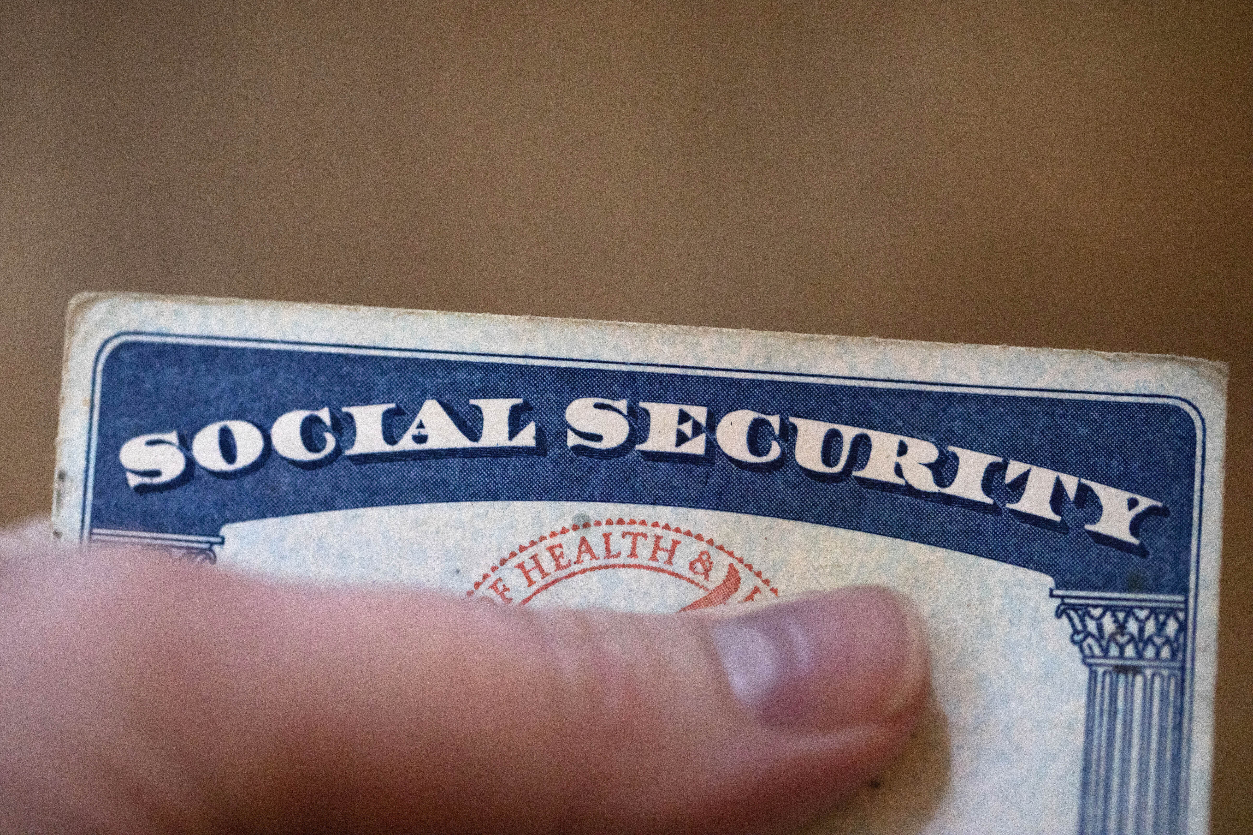 FILE - A Social Security card is displayed on Oct. 12, 2021, in Tigard, Ore. (AP Photo/Jenny Kane, File)