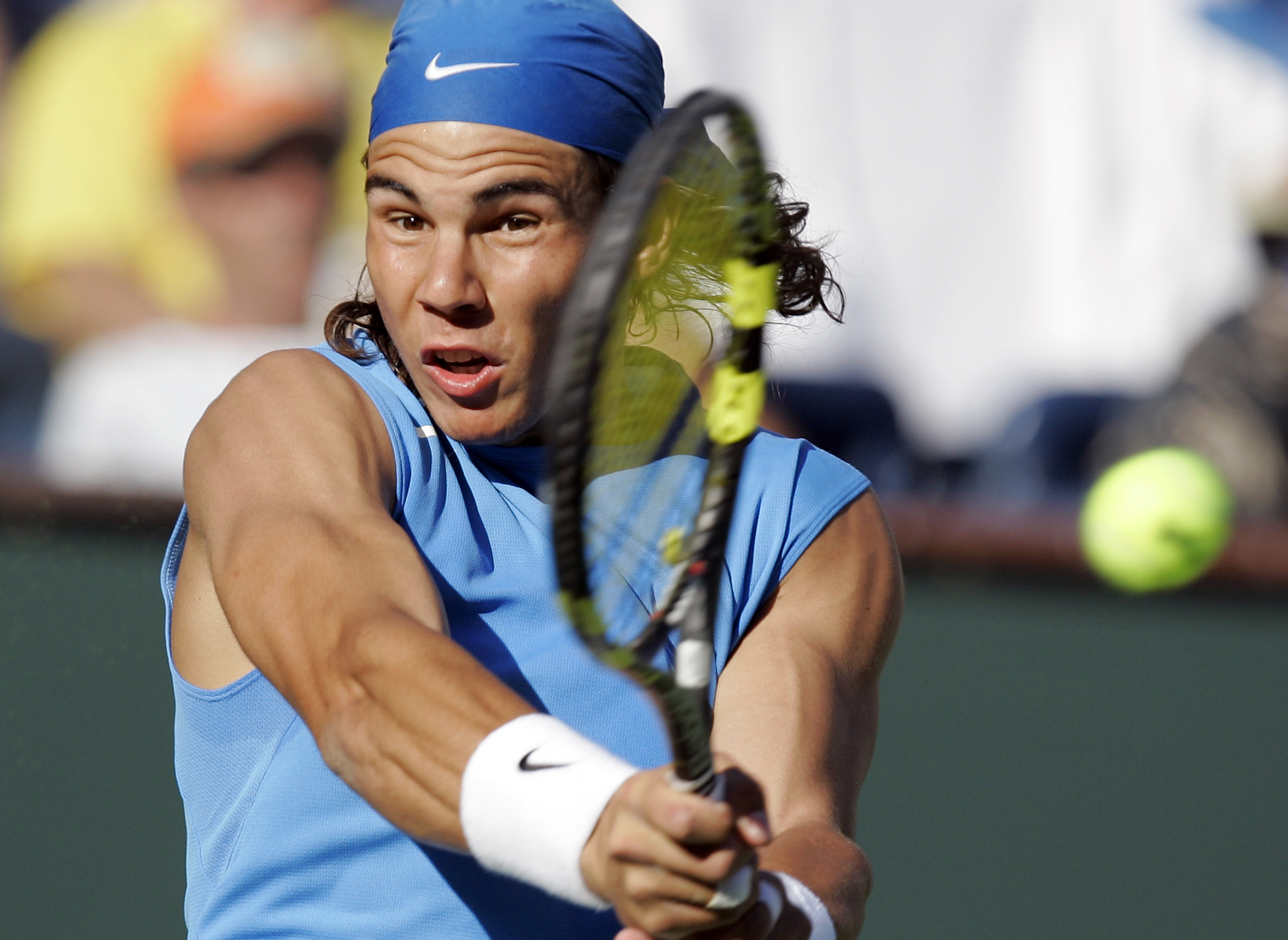 FILE - Rafael Nadal, of Spain, returns a shot to Amaud Clement, of France, during second round play the Pacific Life Open tennis tournament, Saturday, March 10, 2007, in Indian Wells, Calif., as he has announced he will retire from tennis at age 38 following the Davis Cup finals in November. (AP Photo/Mark J. Terrill, File)