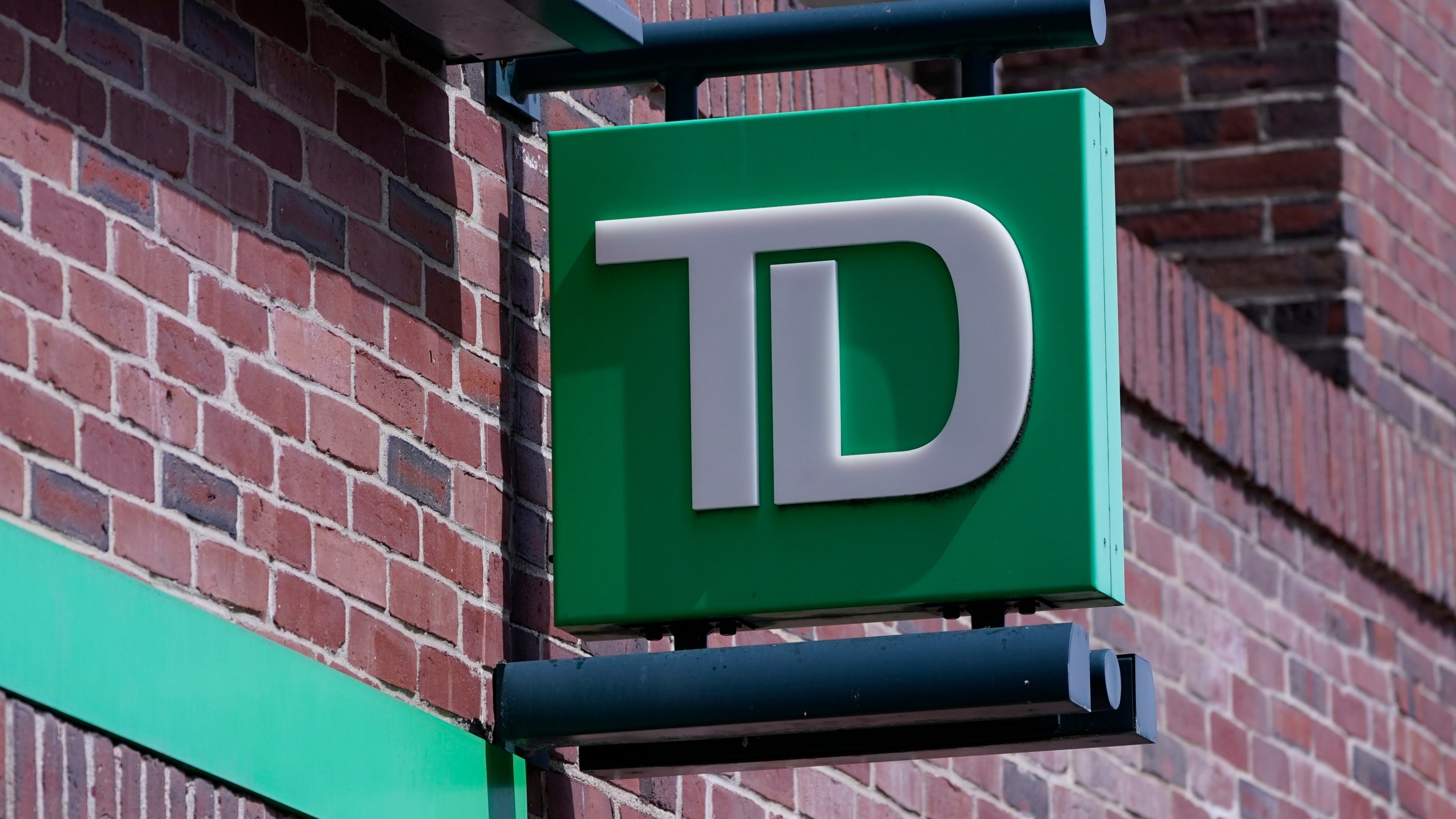 FILE - A sign hangs on TD Bank branch, Tuesday, April 5, 2022, in Boston. (AP Photo/Charles Krupa, File)