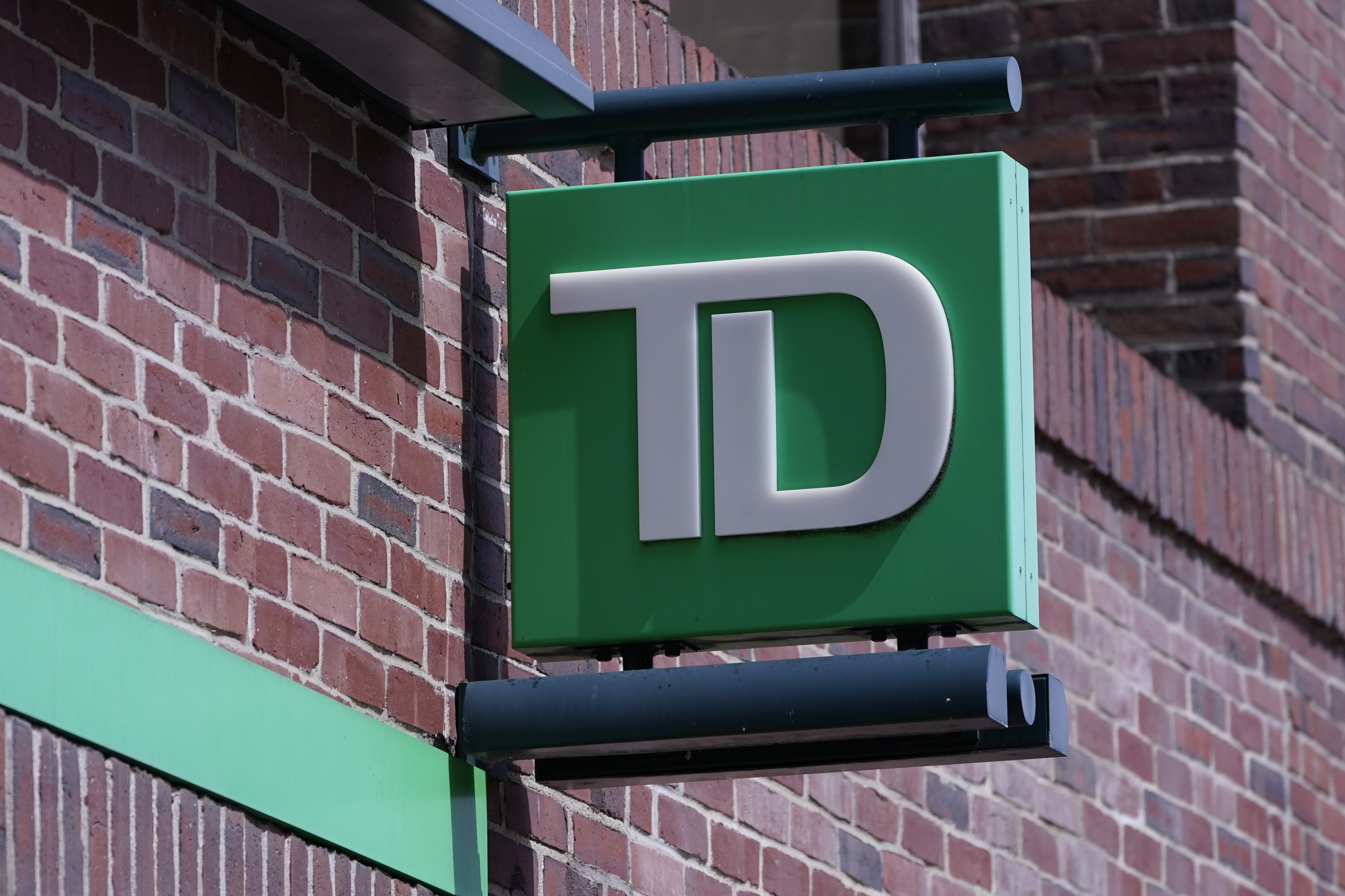 FILE - A sign hangs on TD Bank branch, Tuesday, April 5, 2022, in Boston. (AP Photo/Charles Krupa, File)