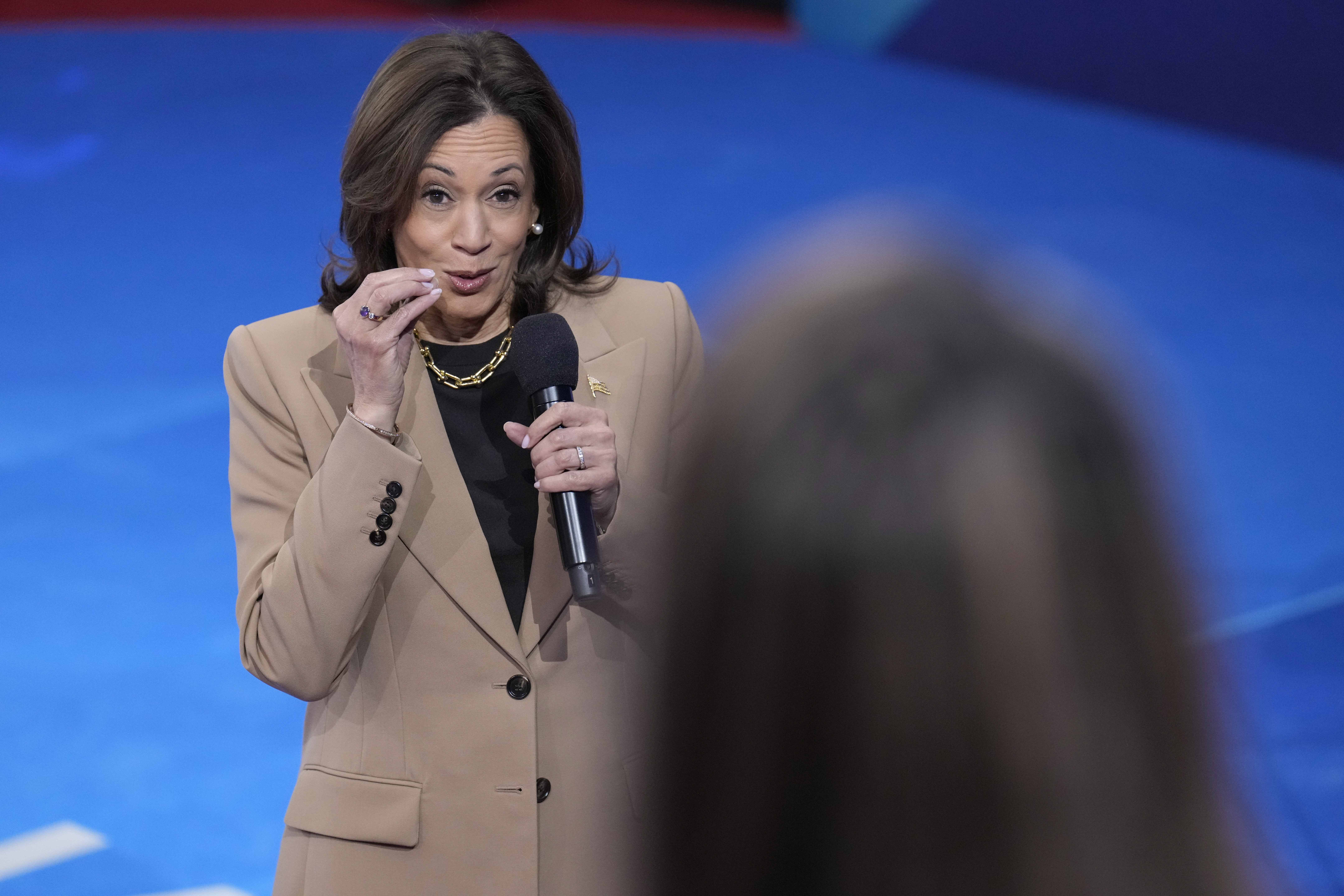 Democratic presidential nominee Vice President Kamala Harris responds to a question from Ivett Castillo, of Las Vegas, during a Town Hall event hosted by Univision, Thursday, Oct. 10, 2024, at the University of Nevada Las Vegas. (AP Photo/Jacquelyn Martin)