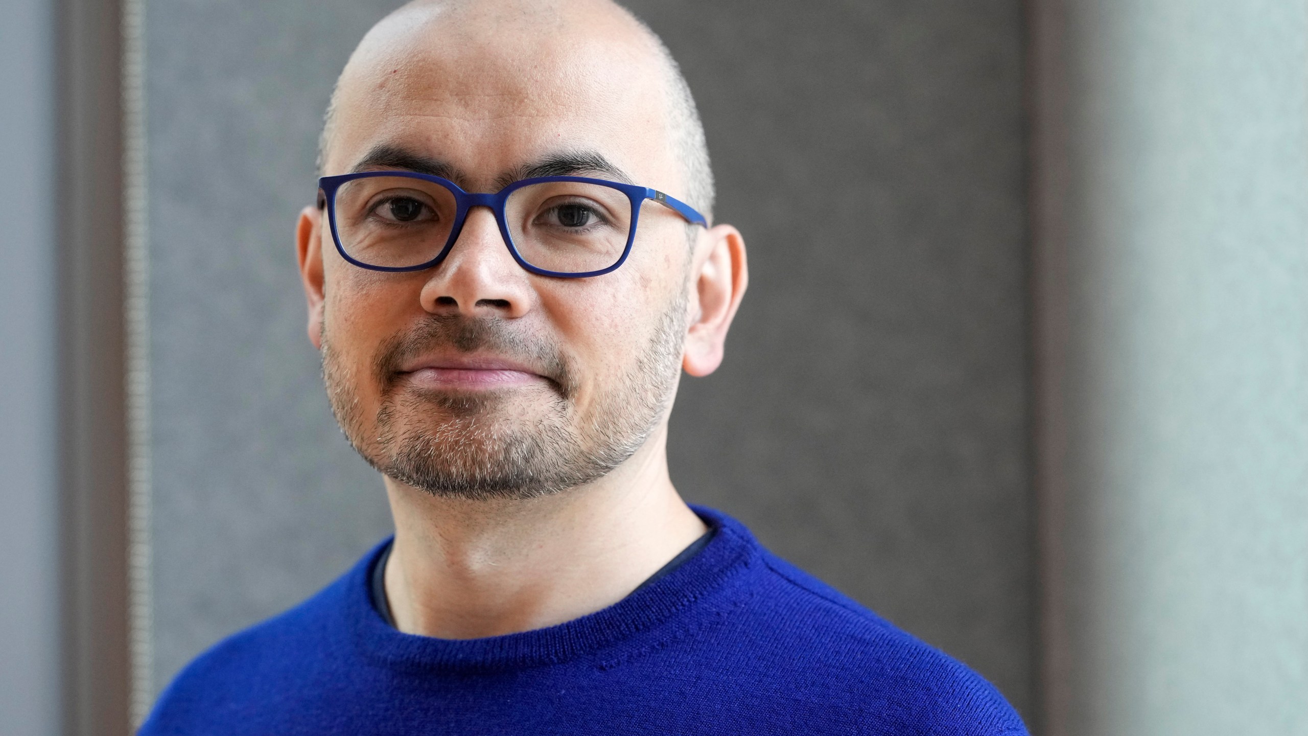 Demis Hassabis, CEO of DeepMind Technologies, the AI division behind Gemini, poses for a photo at the Google DeepMind offices in London, Wednesday, Oct. 9, 2024 after being awarded with the Nobel Prize in Chemistry.(AP Photo/Alastair Grant)