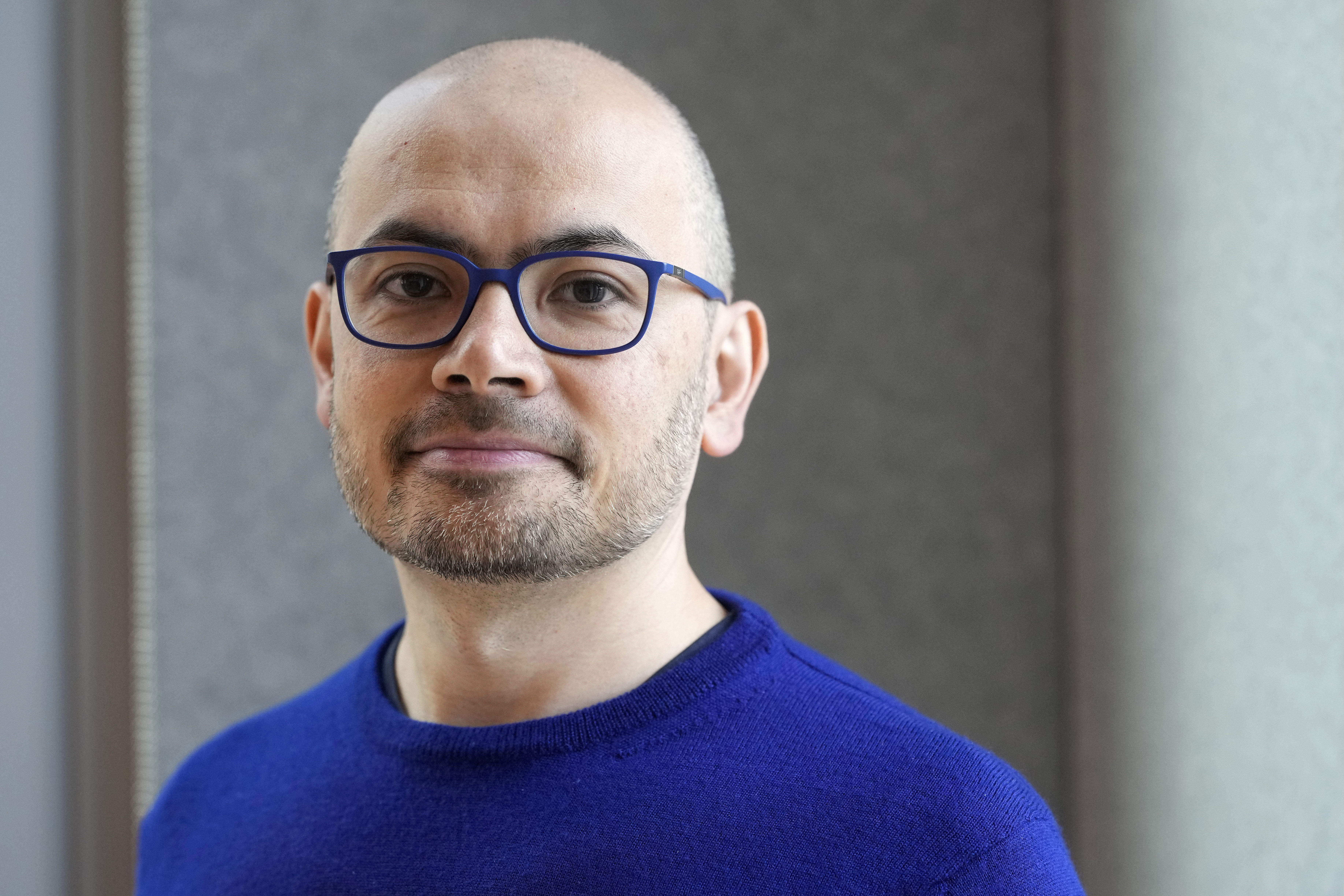 Demis Hassabis, CEO of DeepMind Technologies, the AI division behind Gemini, poses for a photo at the Google DeepMind offices in London, Wednesday, Oct. 9, 2024 after being awarded with the Nobel Prize in Chemistry.(AP Photo/Alastair Grant)