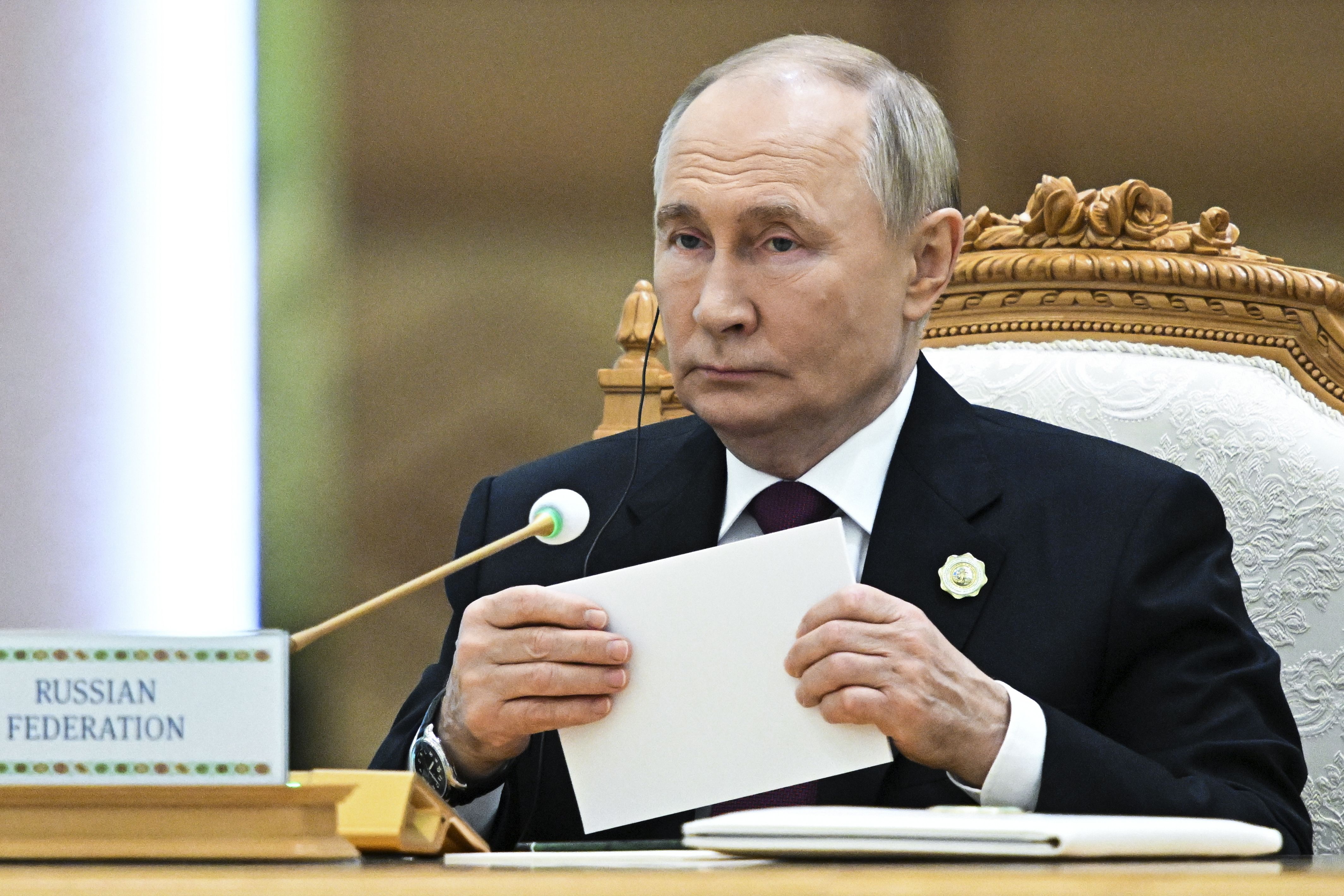 Russian President Vladimir Putin attends the International Forum "The Interconnection of Times and Civilizations – the basis of peace and development" dedicated to the 300th anniversary of the birth of the outstanding Turkmen poet and thinker Magtymguly Fragi in Ashgabat, Turkmenistan, Friday, Oct. 11, 2024. (Sergei Bobylev, Sputnik, Kremlin Pool Photo via AP)