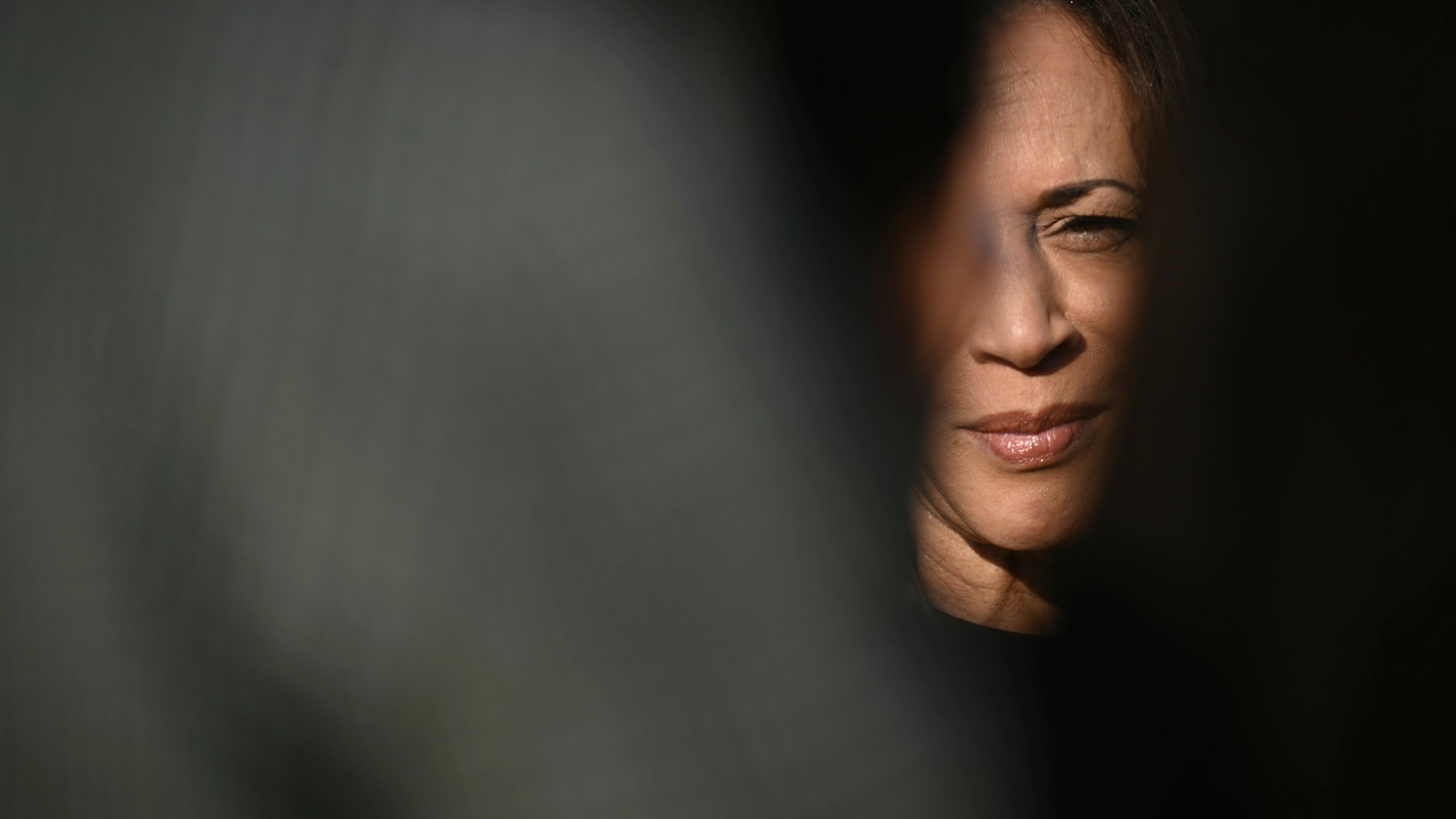 Democratic presidential nominee Vice President Kamala Harris speaks to the press before boarding Air Force Two at Joint Base Andrews, Md., Saturday, Oct. 12, 2024, en route to North Carolina for a campaign event. (Brendan Smialowski/Pool via AP)