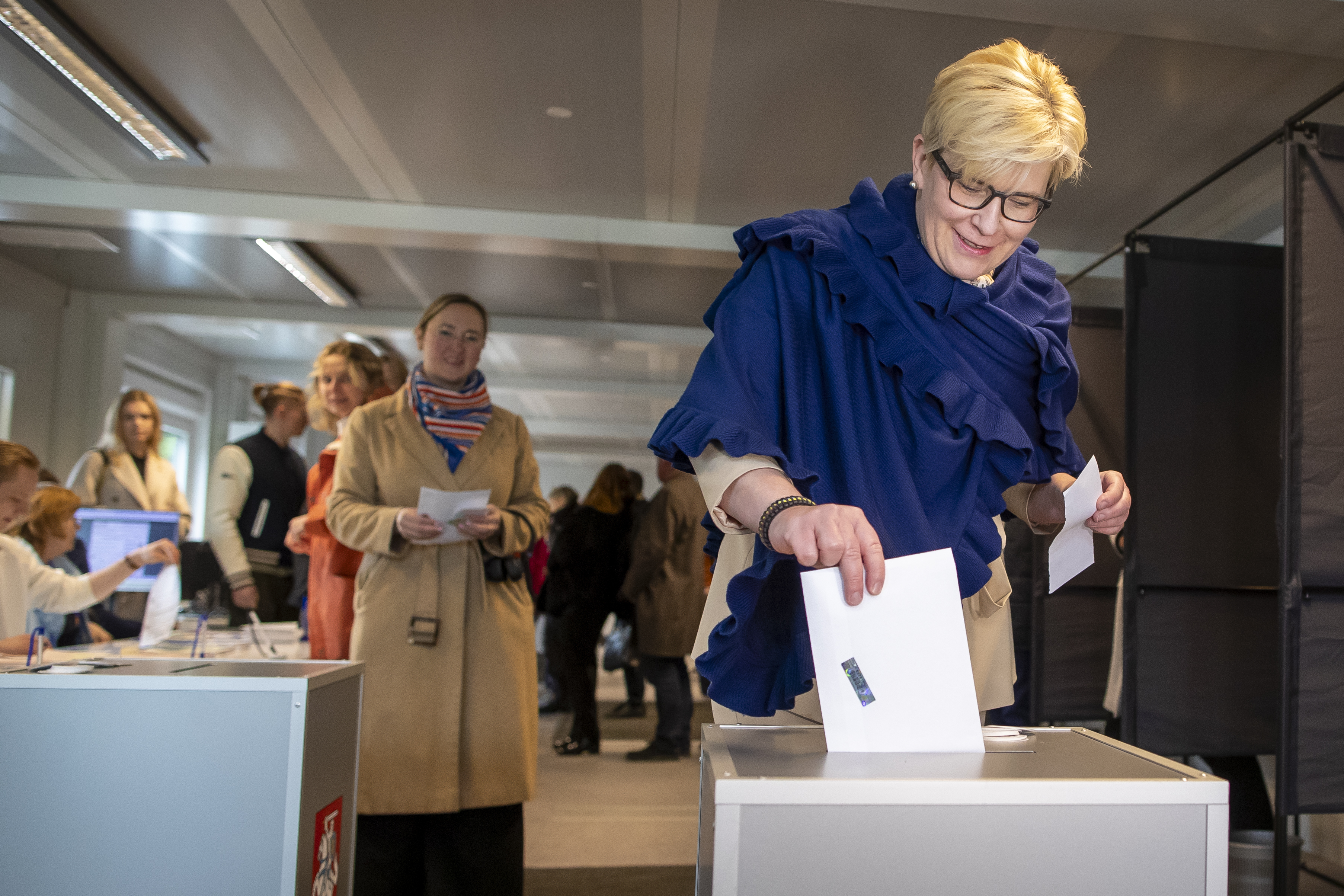 FILE - Lithuania's Prime Minister Ingrida Simonyte, a presidential candidate, casts her vote at a polling station during the advance presidential elections in Vilnius, Lithuania, Thursday, May 9, 2024. (AP Photo/Mindaugas Kulbis, File)