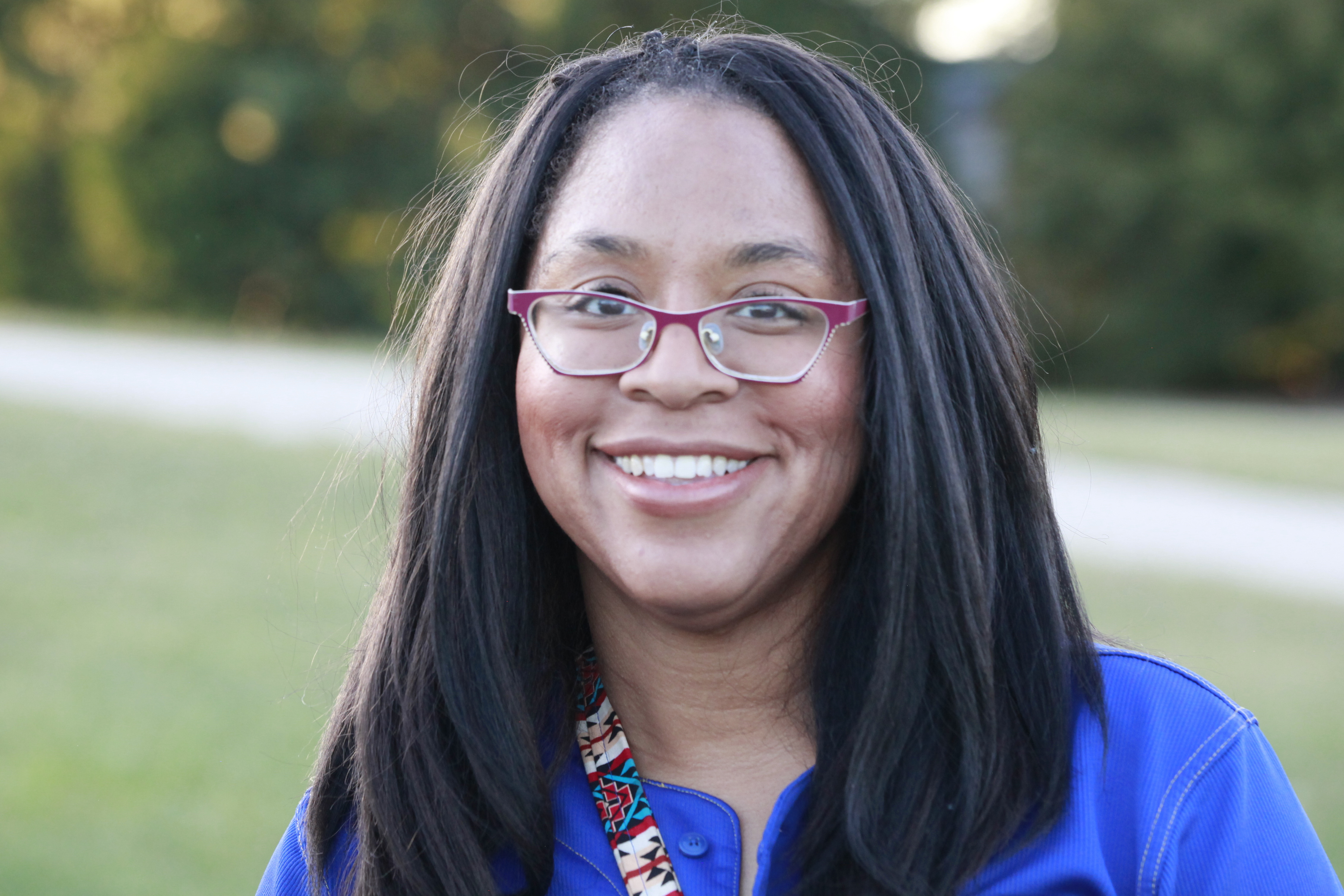 Vanessa Vaughn West, a Democratic candidate for the Kansas House, answers questions about her campaign during a break in walking-door-to-door in the neighborhood around her home, Tuesday, Oct. 1, 2024, in Shawnee, Kansas. (AP Photo/John Hanna)