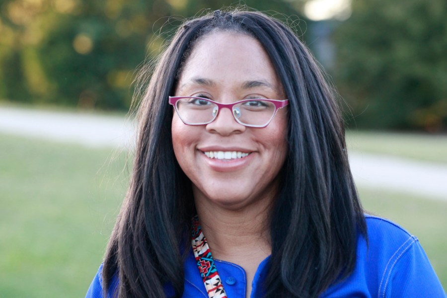 Vanessa Vaughn West, a Democratic candidate for the Kansas House, answers questions about her campaign during a break in walking-door-to-door in the neighborhood around her home, Tuesday, Oct. 1, 2024, in Shawnee, Kansas. (AP Photo/John Hanna)