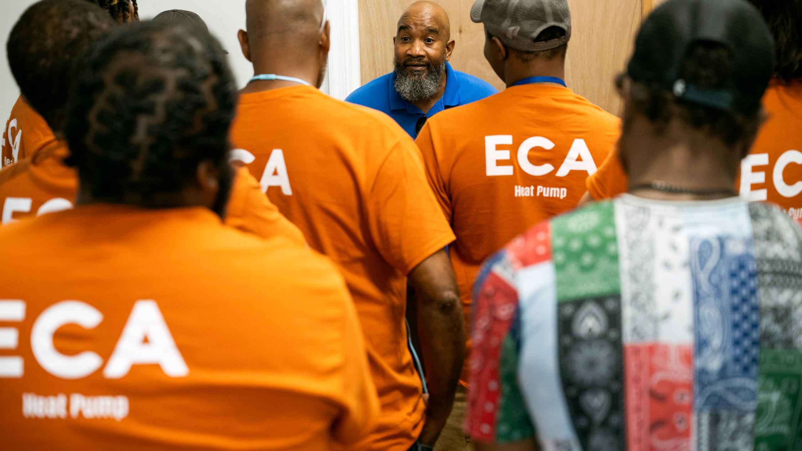 Jackie Robinson, an instructor at the Energy Coordinating Agency, a nonprofit focused in part on energy equity, teaches a class at the facility on Tuesday, July 2, 2024, in Philadelphia. (AP Photo/Joe Lamberti)